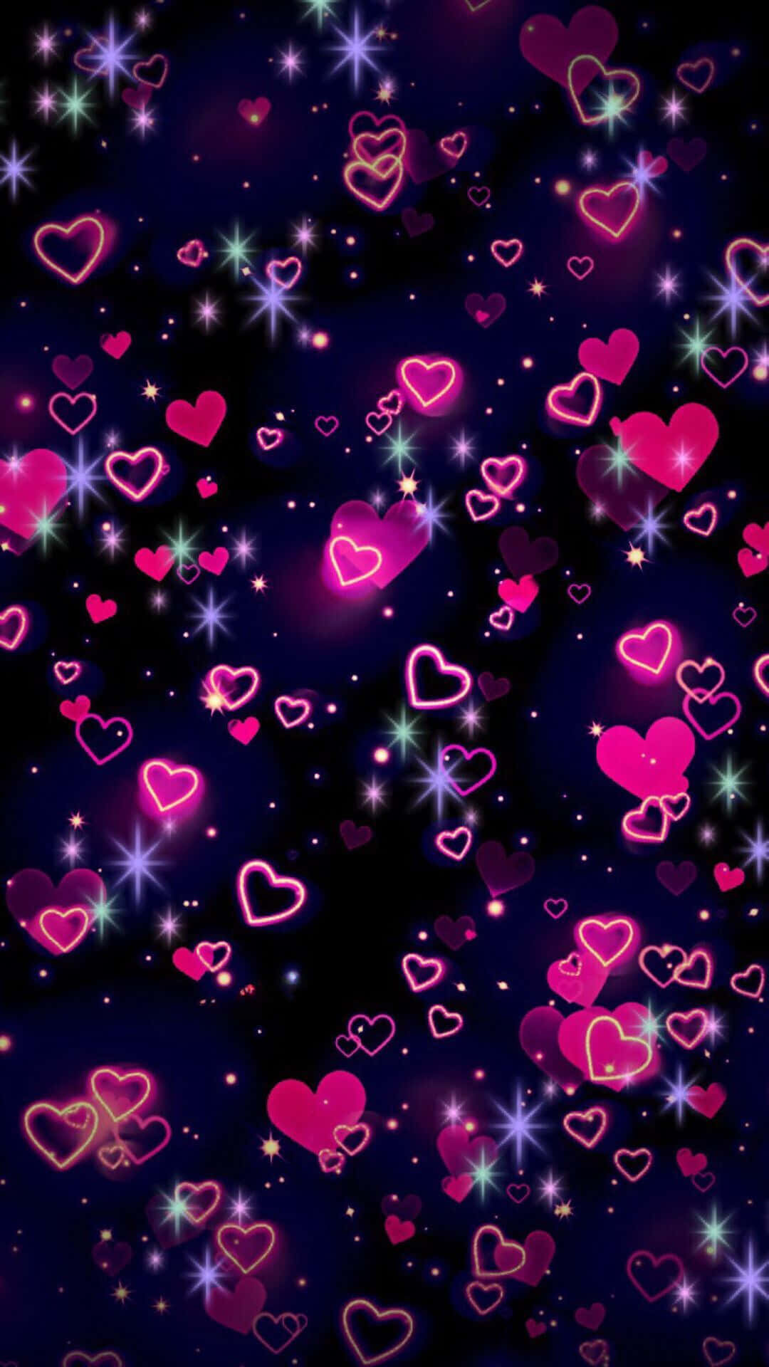 Cute Hearts 桌布 壁紙 — 充滿活力的粉紅色發光心形在閃爍的星星中漂浮，映襯著深邃的宇宙夜空。