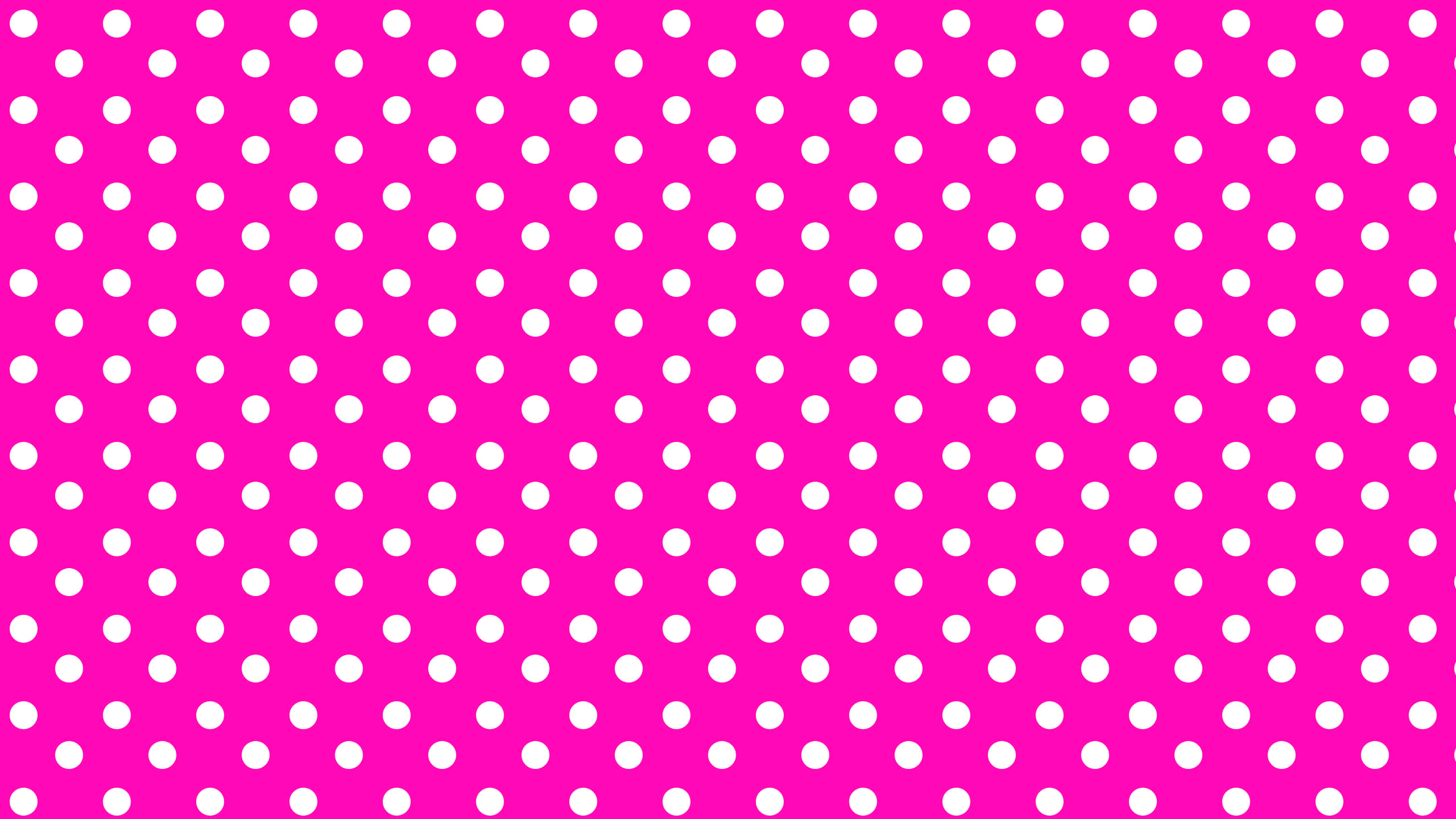 Pink Polka Dot 桌布 壁紙 — 充滿活力的粉紅色背景，均勻分佈白色圓點，形成大膽的圖案。