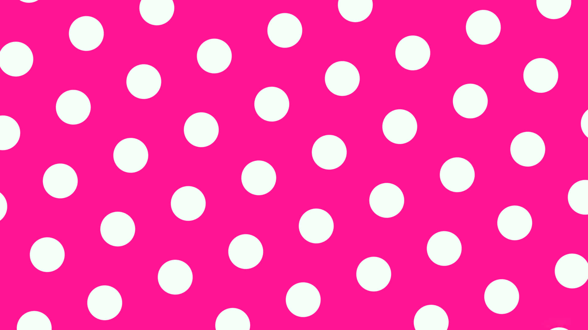 Pink Polka Dot 桌布 壁紙 — 充滿活力的粉紅色背景，飾有均勻分佈的白色圓點，形成大膽的圖案。