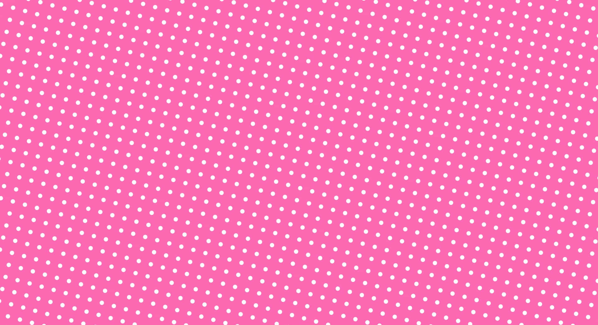 Pink And White Aesthetic 桌布 壁紙 — 充滿活力的粉紅色背景，飾有均勻分佈的白色圓點，呈對角線圖案。