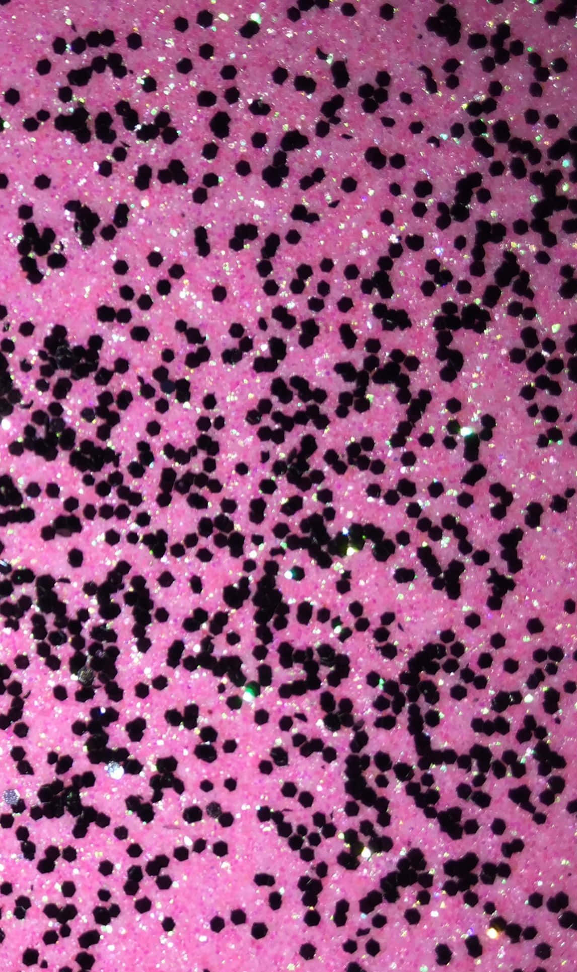 Black And Pink 桌布 壁紙 — 充滿活力的粉紅色閃亮表面，帶有黑色斑點和閃爍亮點。