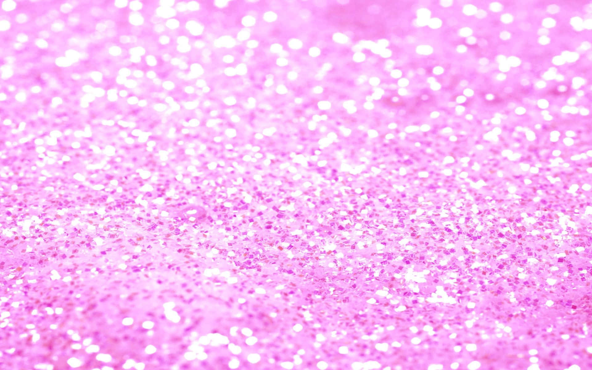 Light Pink Glitter 桌布 壁紙 — 充滿活力的粉紅色閃粉特寫，帶有閃閃發光的白色斑點，營造出閃爍的紋理表面。