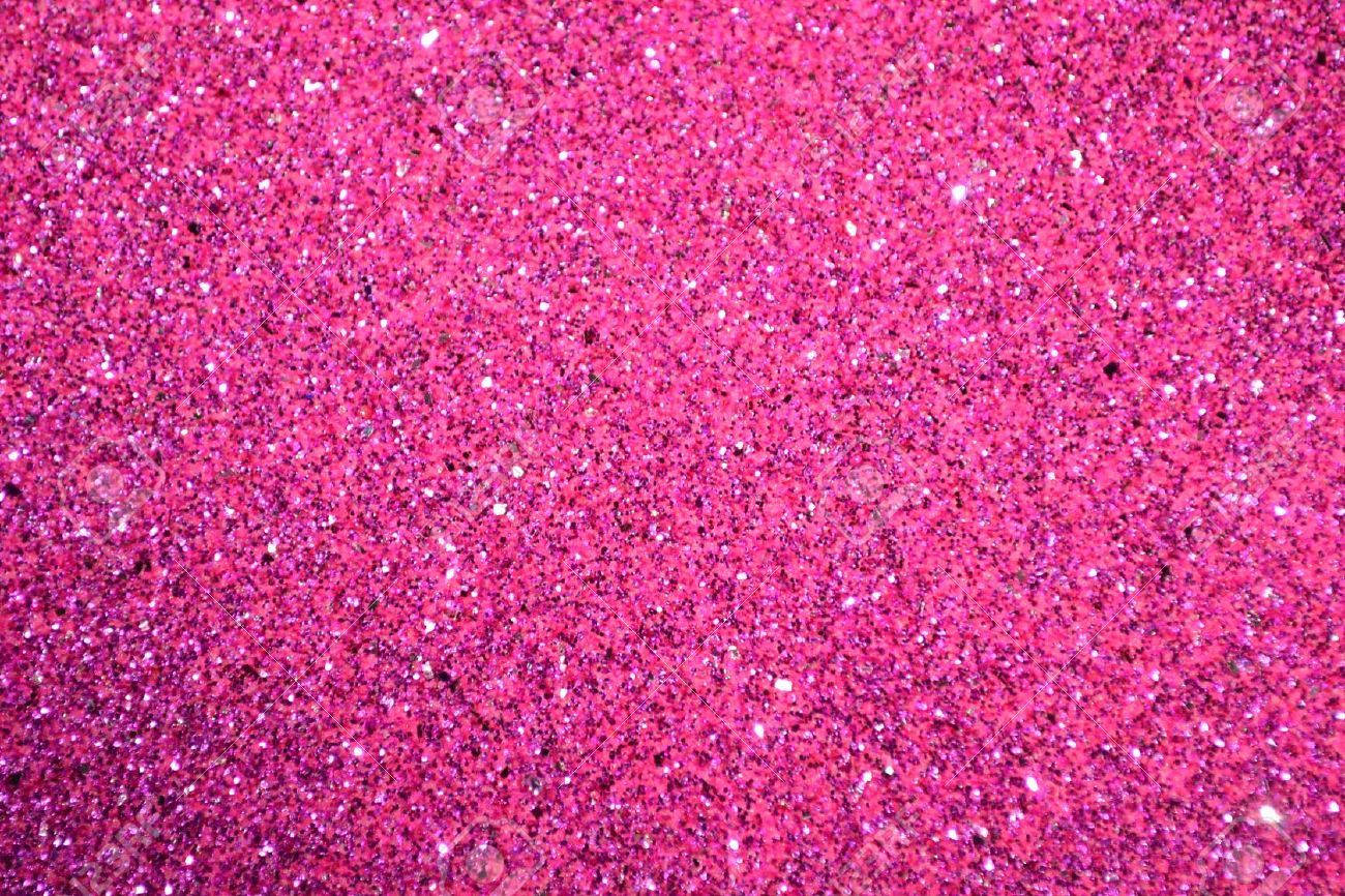 Pink Glitter 桌布 壁紙 — 充滿活力的粉紅色閃粉特寫，閃爍亮點營造出耀眼質感表面。