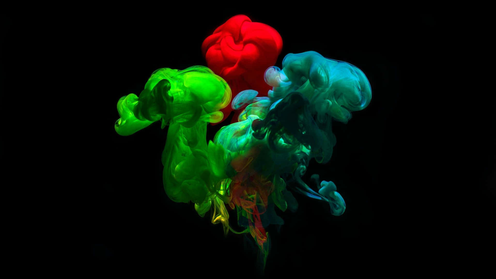 1920x1080 Amoled 桌布 壁紙 — 充滿活力的紅色、綠色和藍色墨水在純黑色背景上動態旋轉，營造出抽象的流體運動。