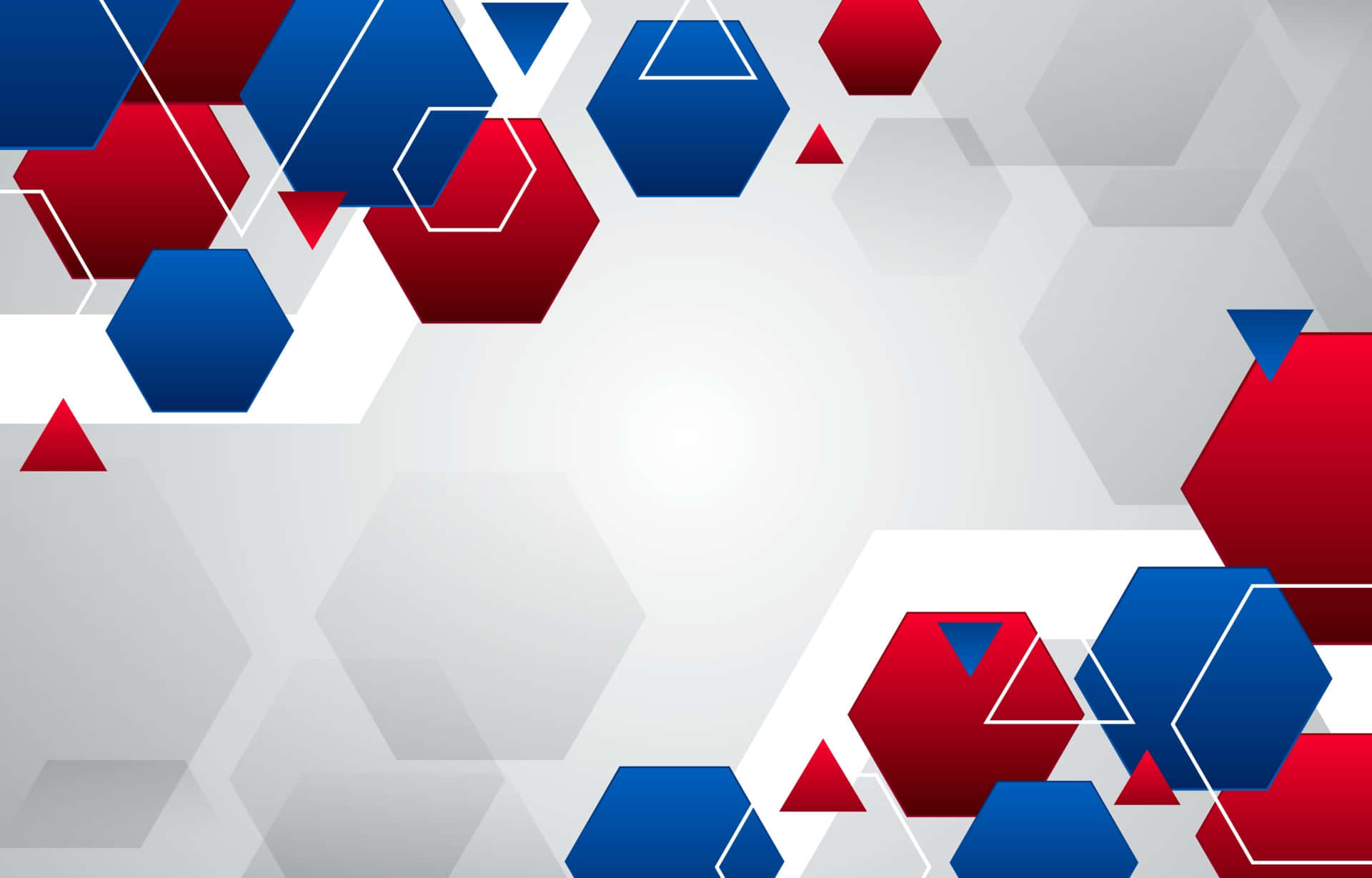 Geometric 桌布 壁紙 — 充滿活力的紅色和藍色幾何六邊形和三角形在柔和的漸變灰色背景上動態漂浮。