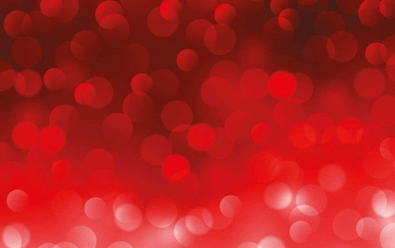 Red Light 桌布 壁紙 — 充滿活力的紅色抽象背景，帶有柔和發光的散景圓圈，逐漸淡入較暗的色調。