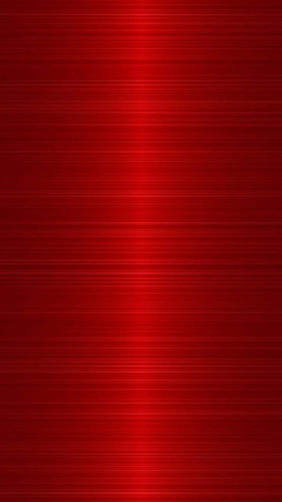 Red Metallic 桌布 壁紙 — 充滿活力的紅色拉絲金屬紋理，帶有垂直條紋和發光的中央高光。