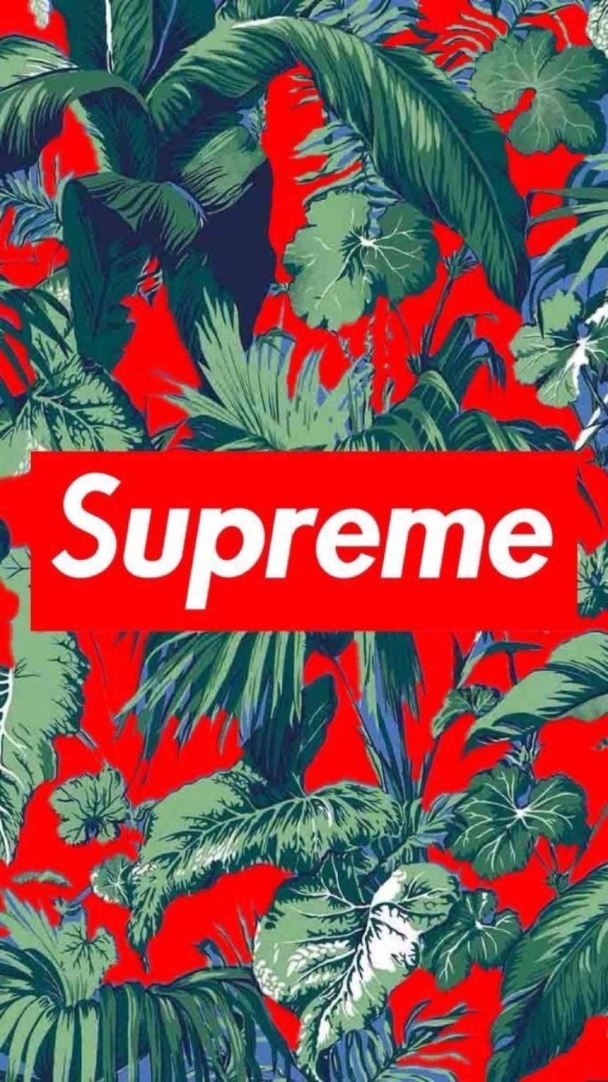 Supreme iPhone 桌布 壁紙 — 充滿活力的紅色背景，配上茂盛的綠色熱帶葉片和置中的粗體白色Supreme標誌。