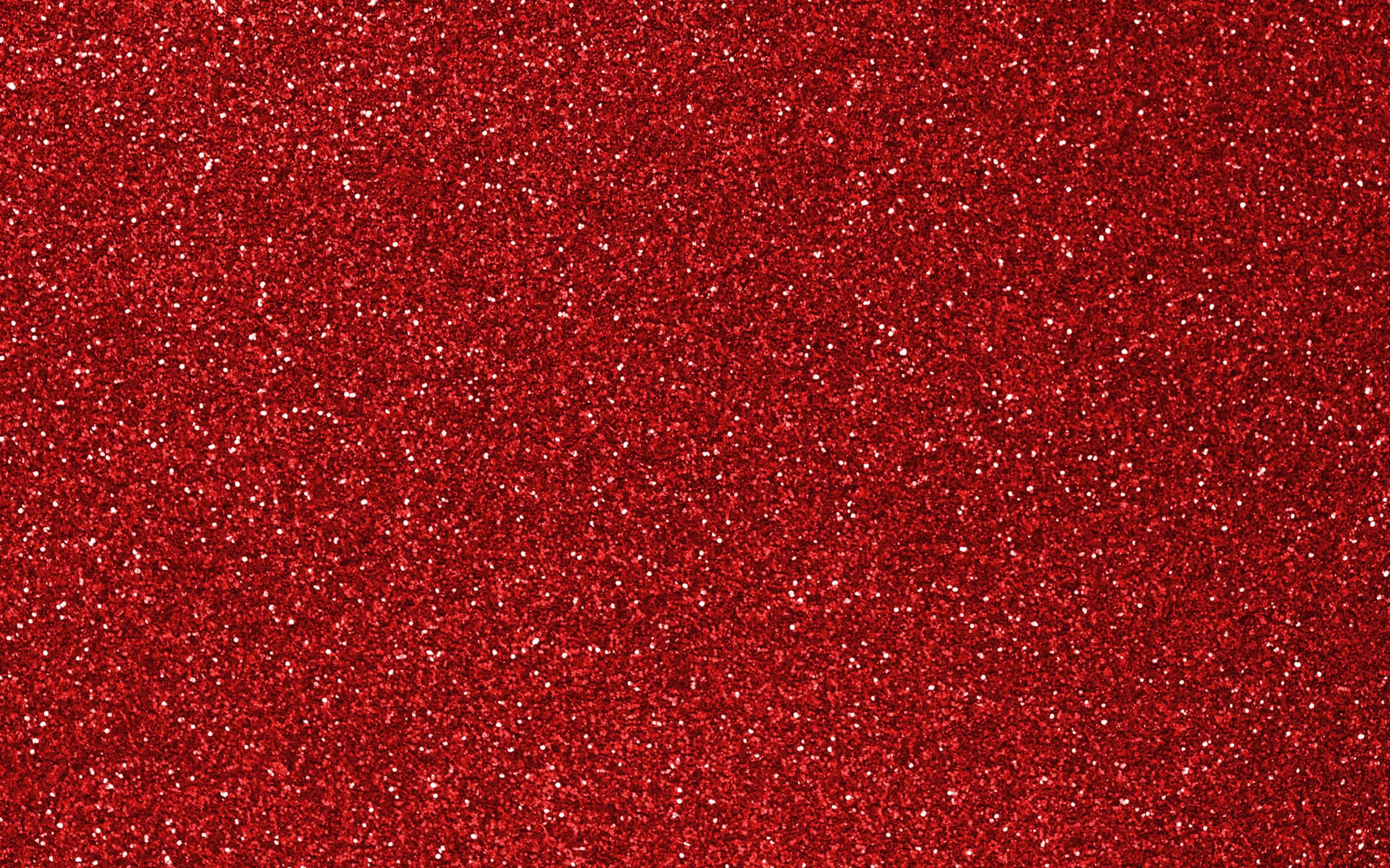 Red Glitter 桌布 壁紙 — 充滿活力的紅色閃粉紋理，帶有閃爍的白色斑點覆蓋整個畫面。