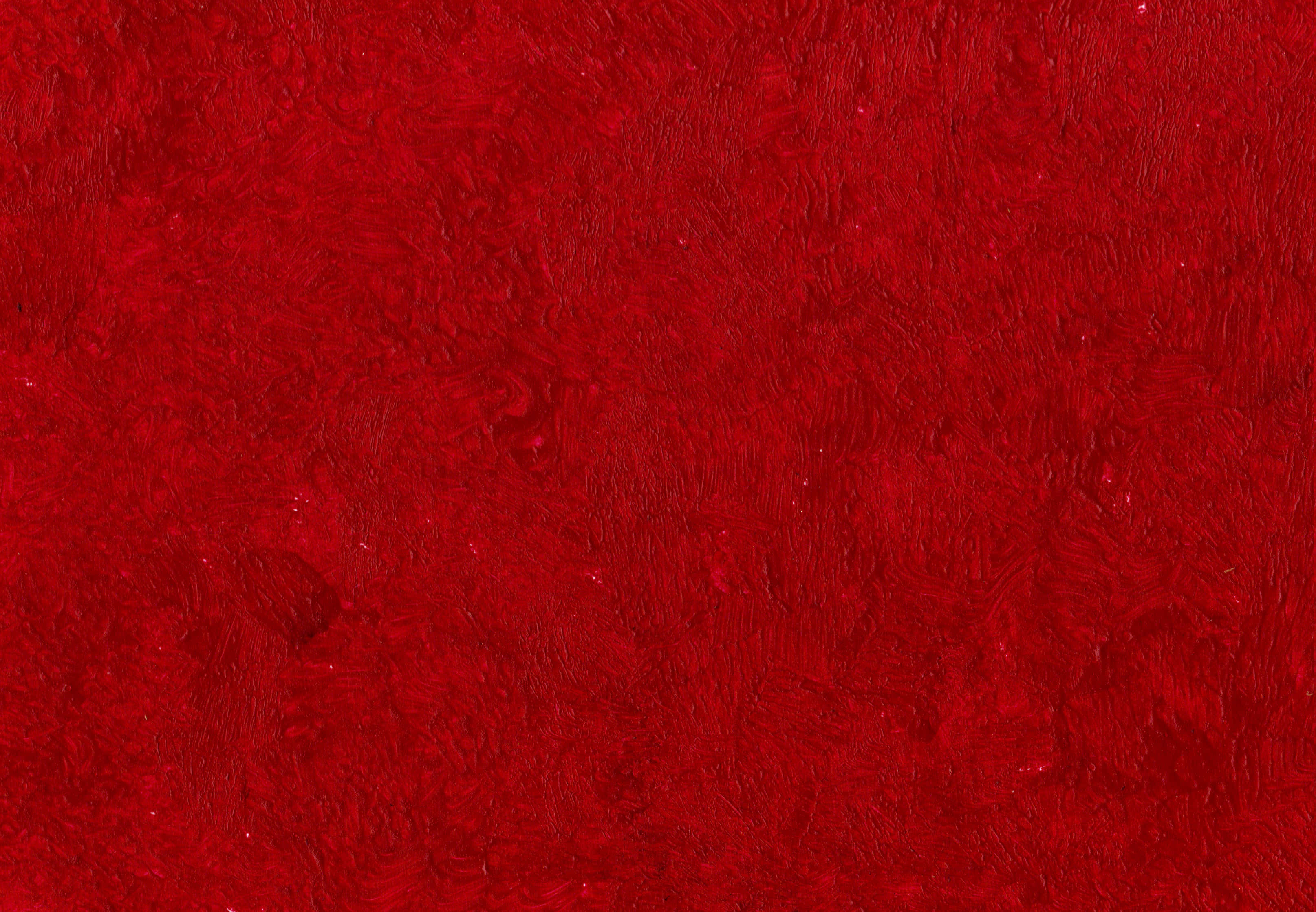 Paint Texture 桌布 壁紙 — 充滿活力的紋理紅色表面，帶有細膩的筆觸圖案和深度變化。