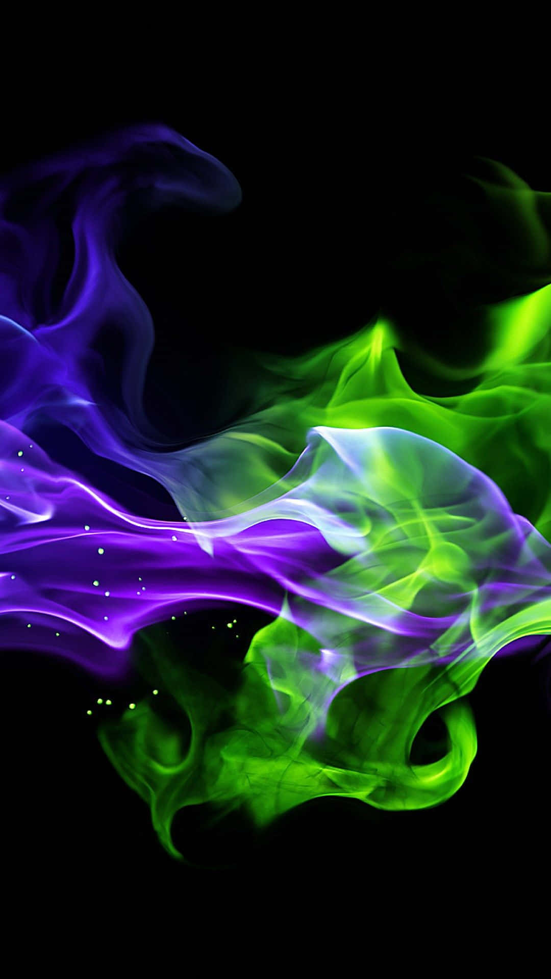 Neon Green And Purple 桌布 壁紙 — 充滿活力的紫色和綠色能量流在漆黑的背景上動態旋轉，並帶有發光粒子。