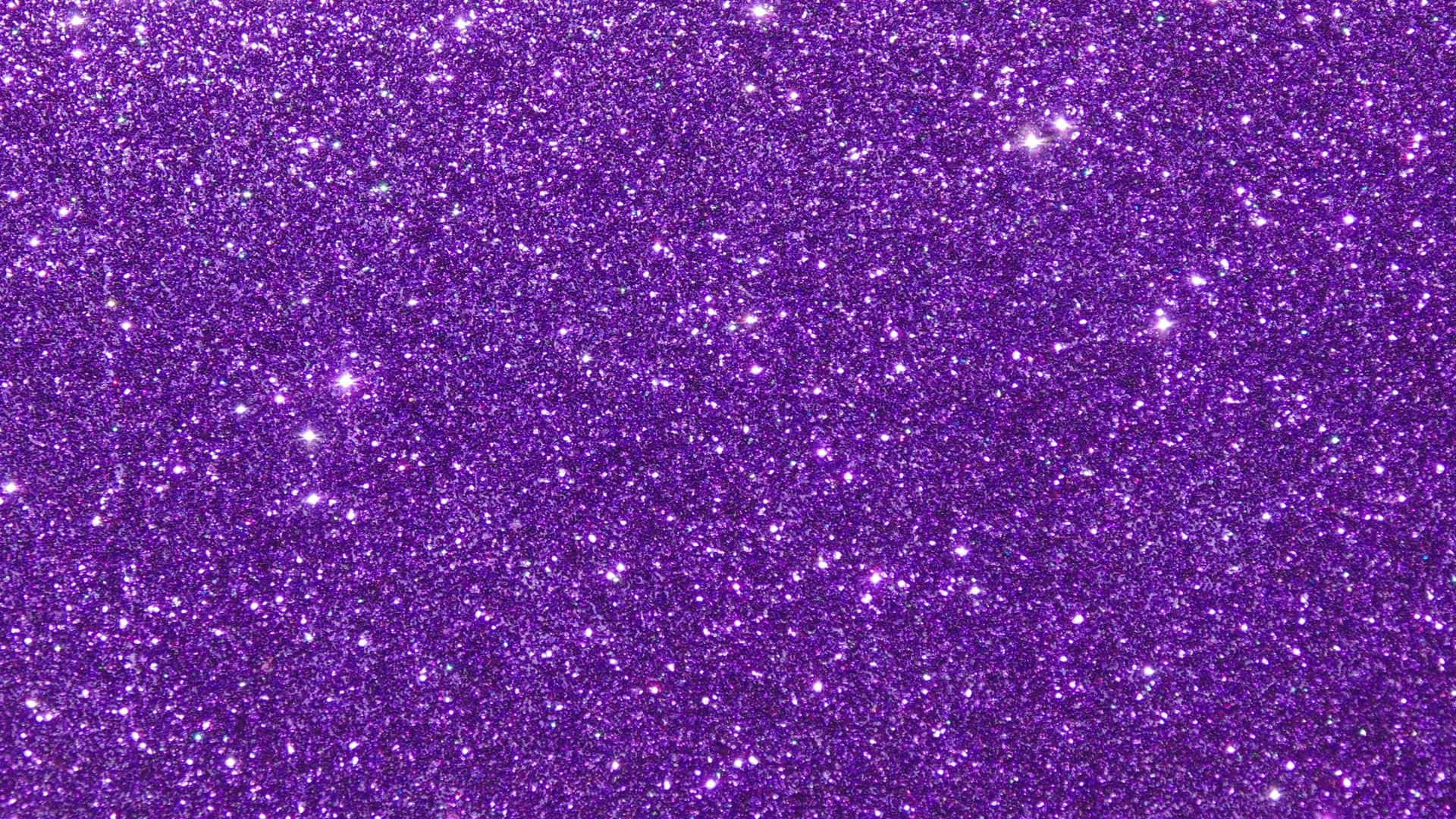 Purple Aesthetic Phone 桌布 壁紙 — 充滿活力的紫色閃粉紋理，帶有閃爍的顆粒，在整個畫面中捕捉光線。