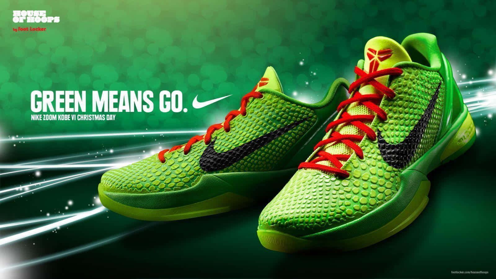 鞋子 桌布 壁紙 — 充滿活力的綠色Nike Zoom Kobe VI運動鞋，配有紅色鞋帶和黑色Swoosh標誌，在閃爍的綠色背景和動態光線條紋中發光。