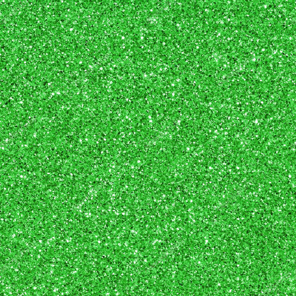 Green Glitter 桌布 壁紙 — 充滿活力的綠色亮粉紋理，帶有銀色閃片覆蓋整個表面。
