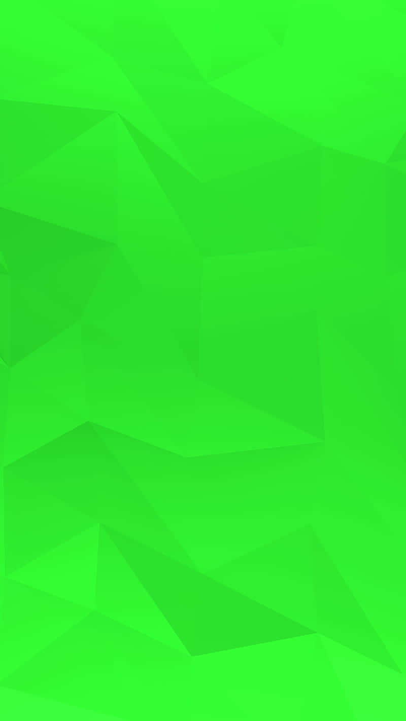 Green Geometric 桌布 壁紙 — 充滿活力的綠色低多邊形幾何桌布，帶有銳利的角面及漸變陰影。