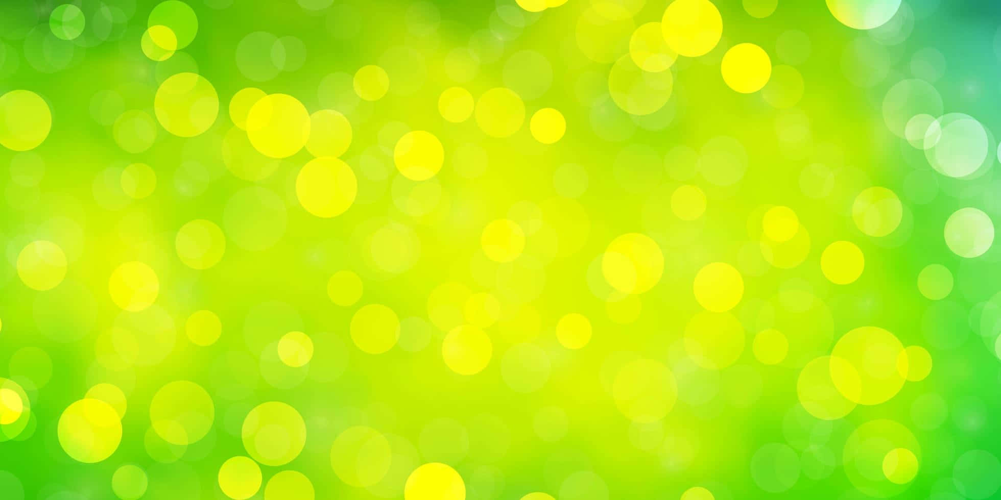 Bokeh 桌布 壁紙 — 充滿活力的綠色和黃色散景燈光在夢幻般的抽象背景上柔和地發光。