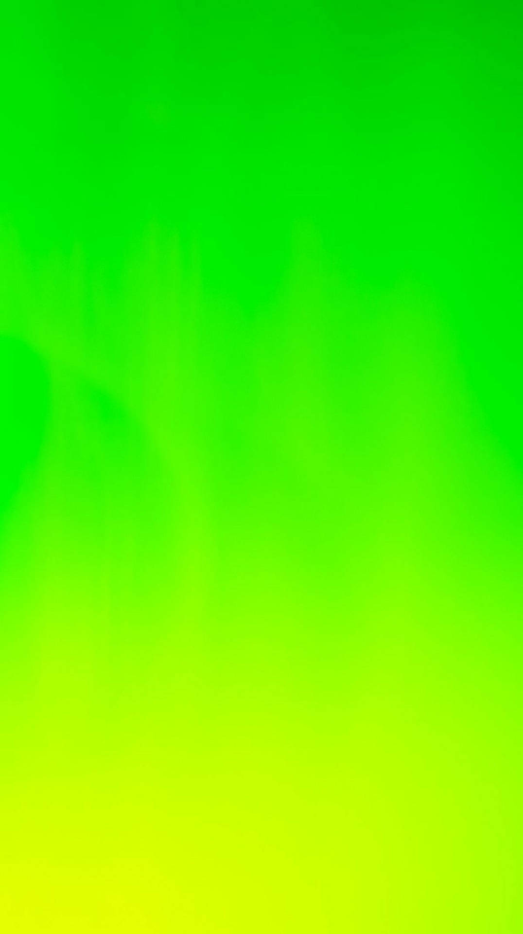 Gradient 桌布 壁紙 — 充滿活力的綠色和黃色漸變，柔和地融合在畫面中，沒有明顯的形狀或物體。