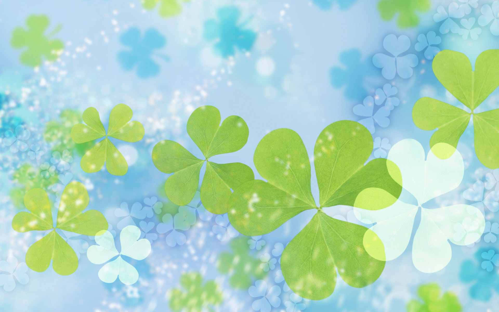 Plant 桌布 壁紙 — 充滿活力的綠色四葉草在柔和的藍色背景上優雅地漂浮，帶有閃爍的光效。