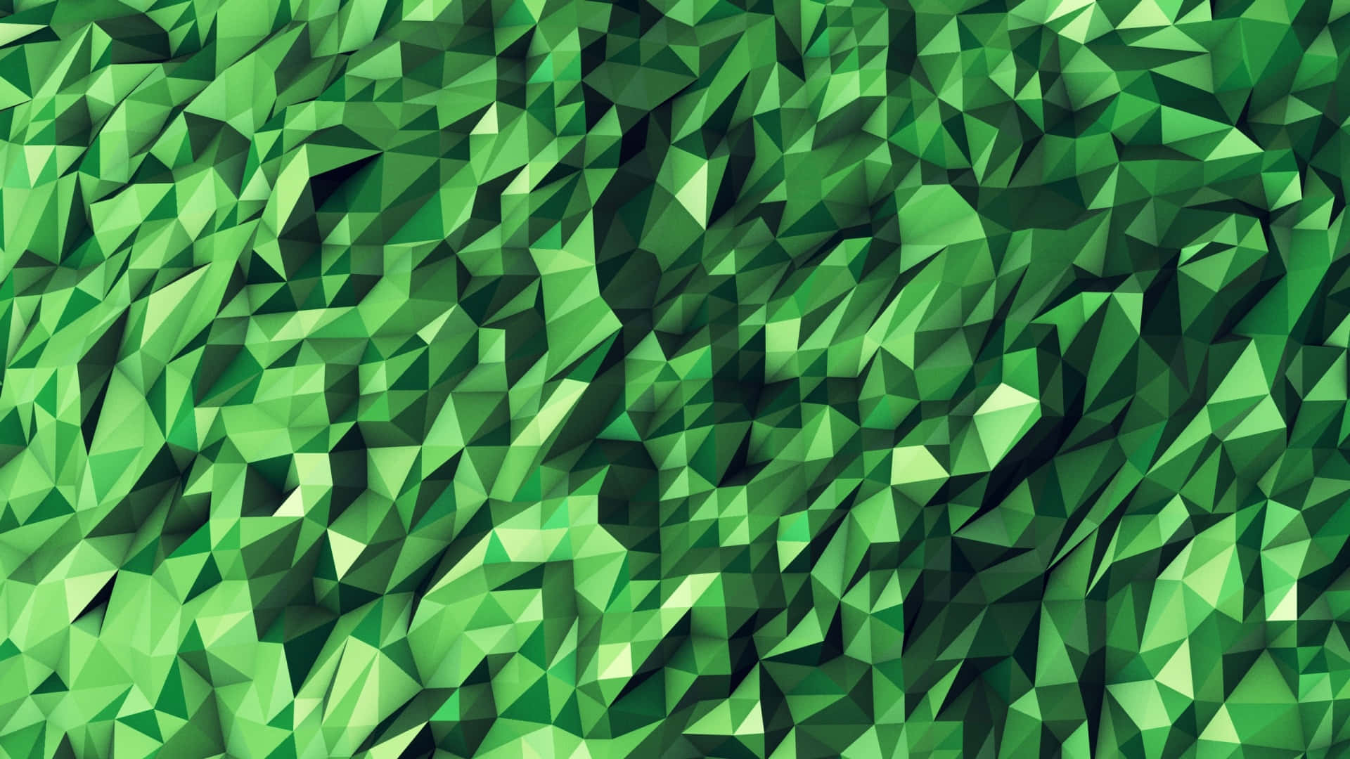 Green Geometric 桌布 壁紙 — 充滿活力的綠色抽象壁紙，帶有低多邊形幾何圖案，由三角形面構成，營造出紋理3D效果。