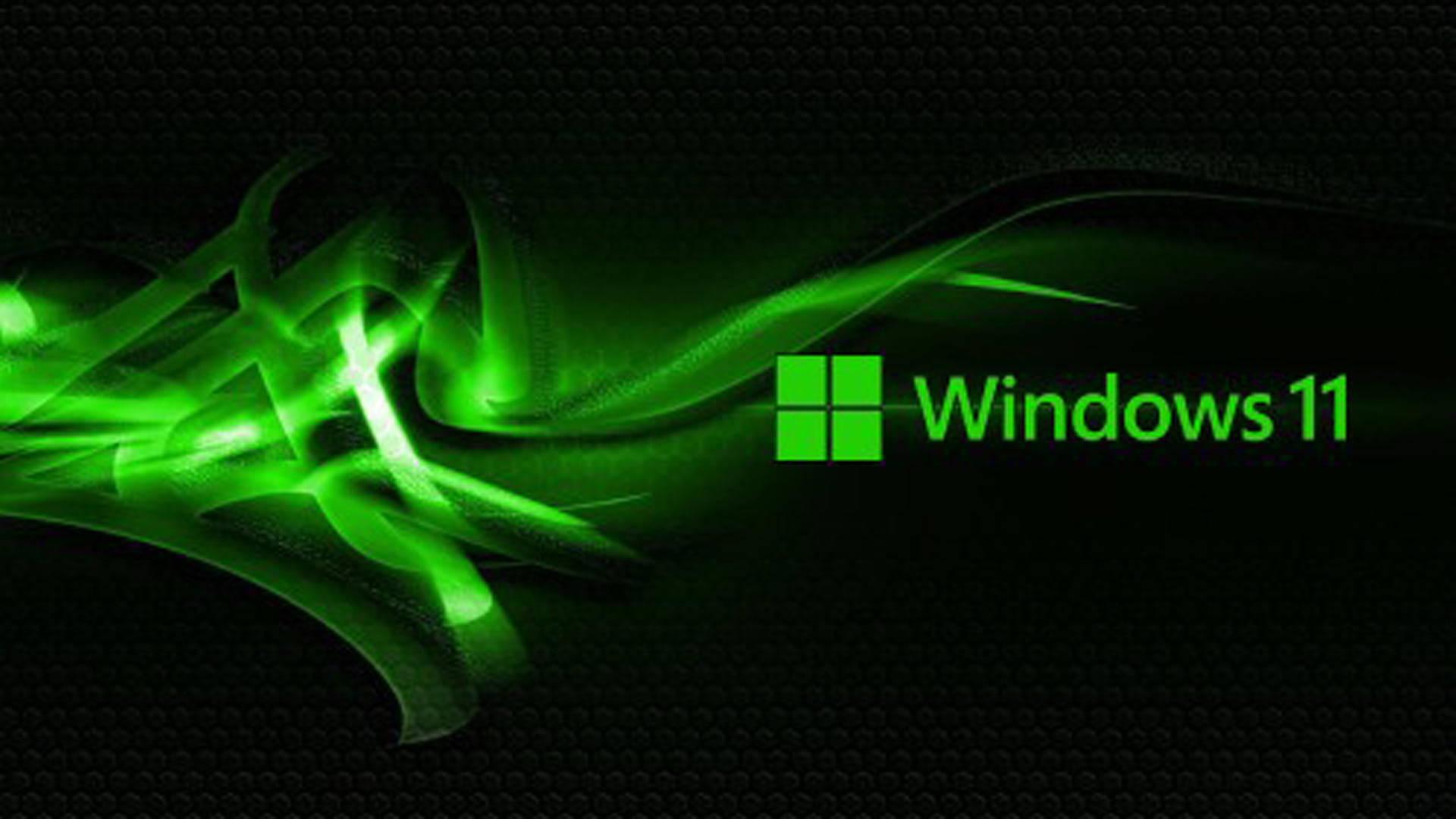 Windows 11 桌布 壁紙 — 充滿活力的綠色數位能量在深色紋理背景上動態流動，Windows 11 標誌突出顯示。