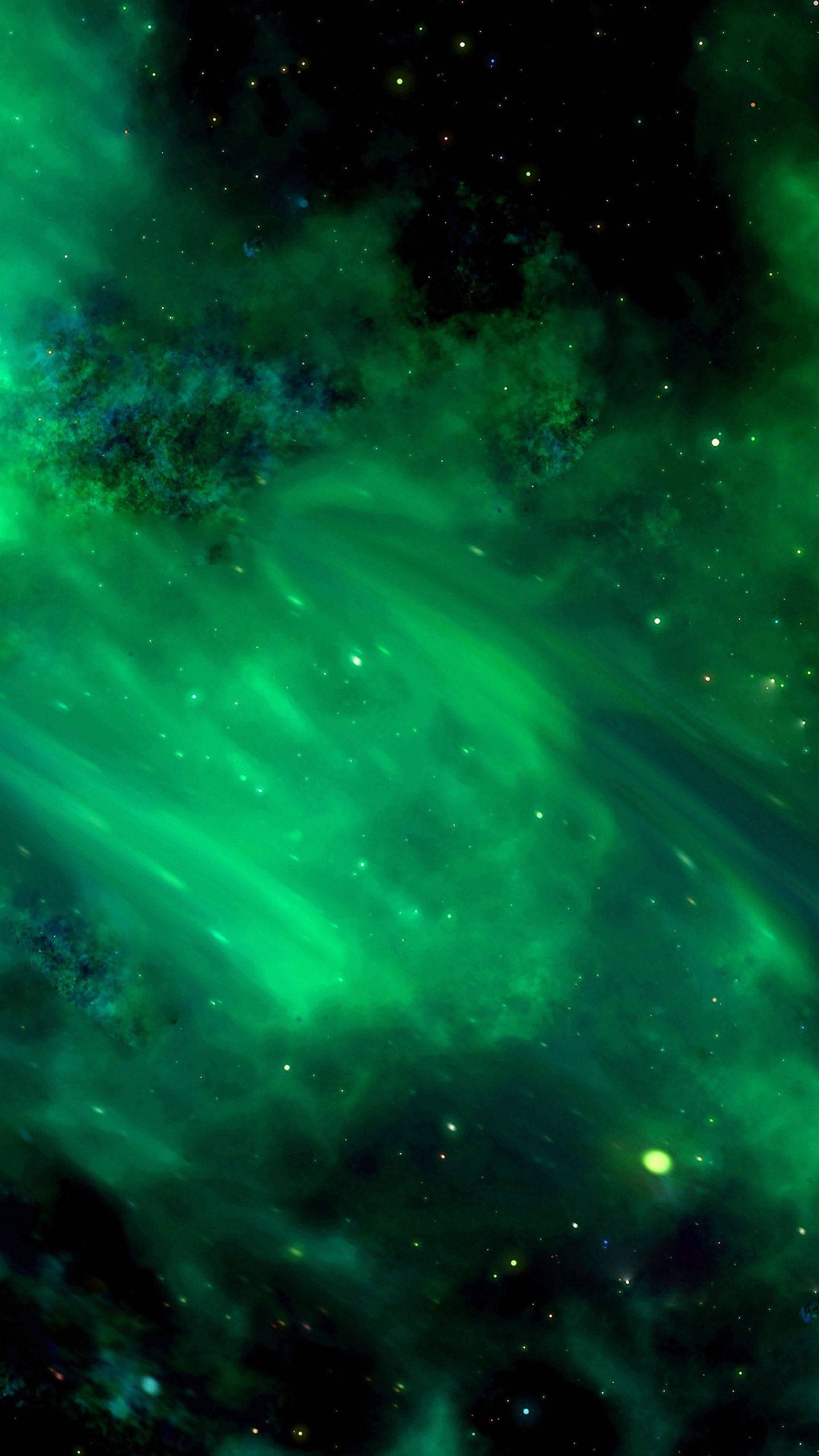 綠色天空 桌布 壁紙 — 充滿活力的綠色星雲在繁星點點的宇宙深處旋轉，帶有發光的卷鬚和散落的明亮星星。