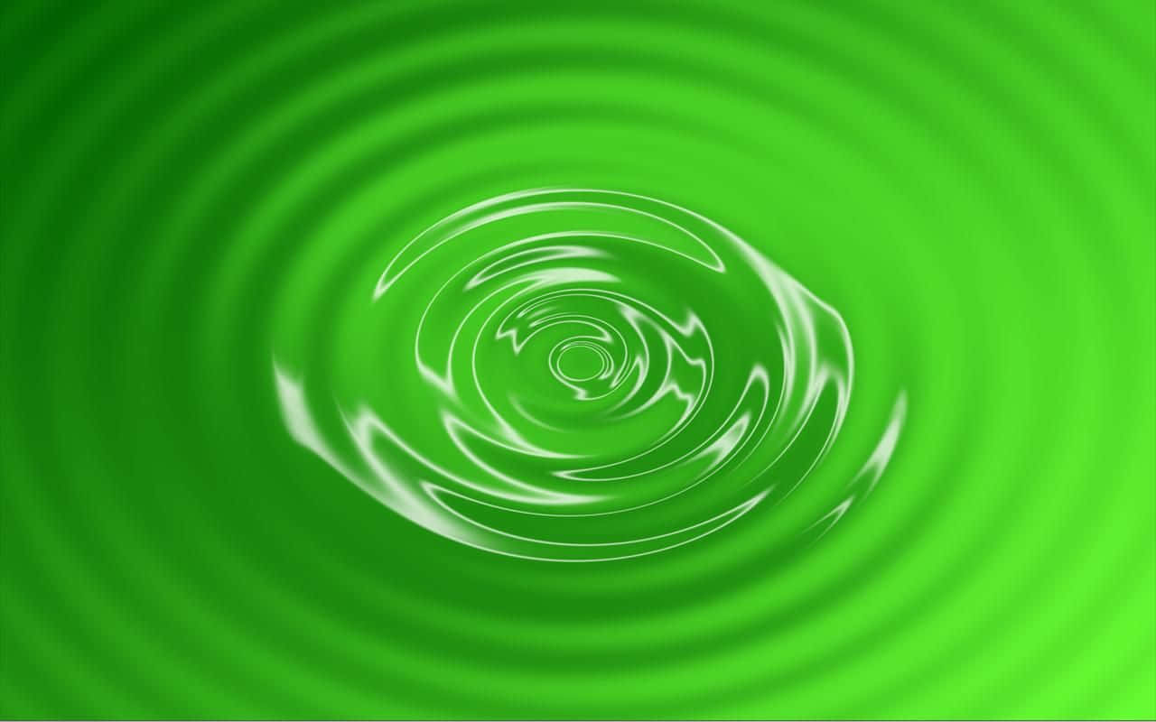 水 桌布 壁紙 — 充滿活力的綠色液體在催眠般的同心漣漪中旋轉，帶有明亮的白色高光。