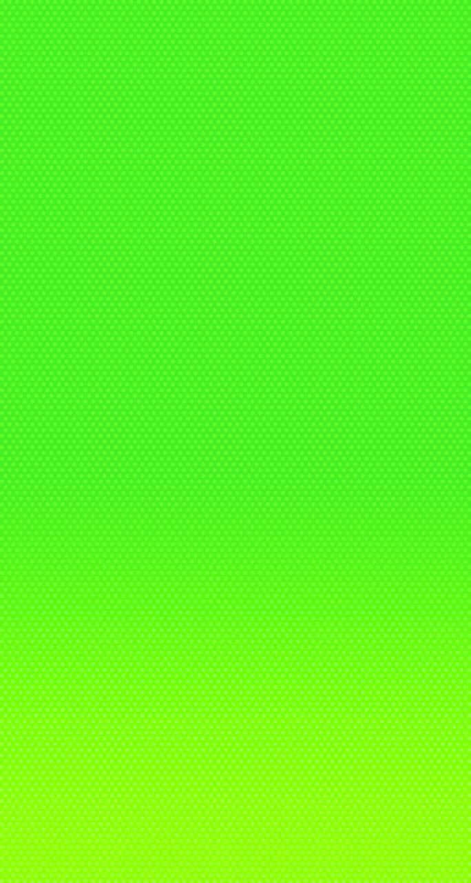 Green Solid Color 桌布 壁紙 — 充滿活力的綠色漸變壁紙，帶有從萊姆色漸變到螢光色的微妙圓點圖案。