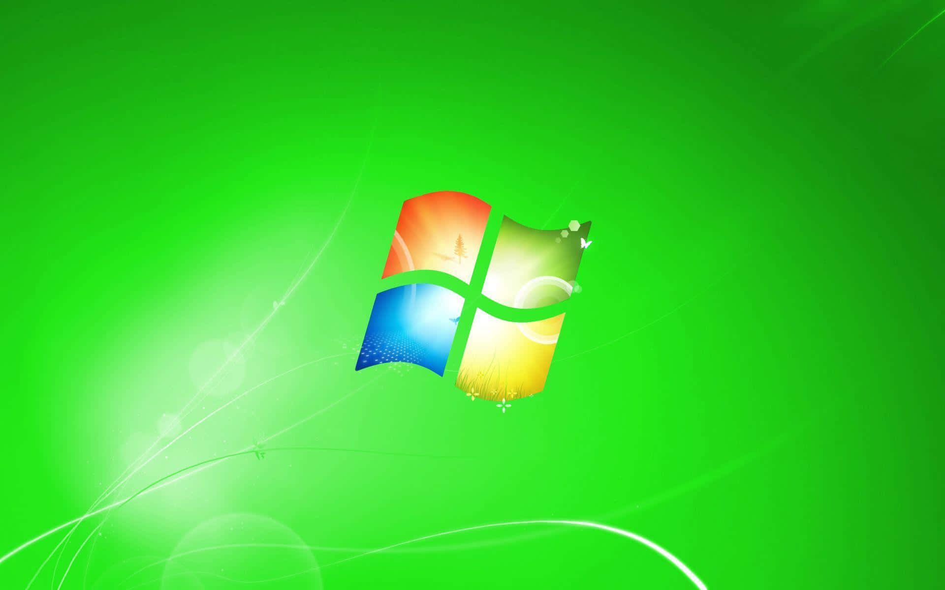 Windows 7 桌布 壁紙 — 充滿活力的綠色漸變背景，帶有色彩繽紛的Windows標誌，並伴有光線條紋和散景效果。