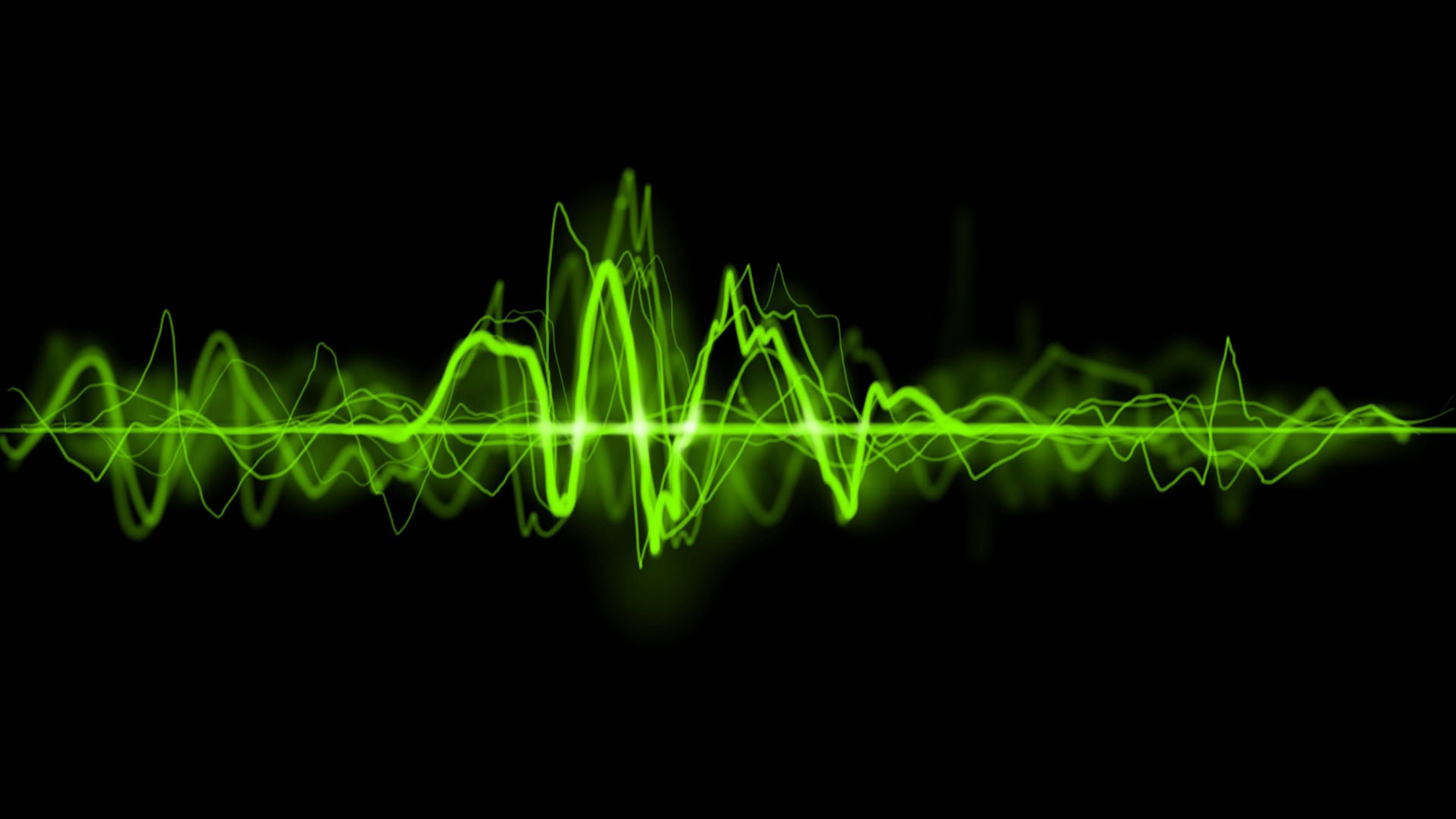 sound wave 桌布 壁紙 — 充滿活力的綠色音頻波形在純黑色背景上動態脈動。