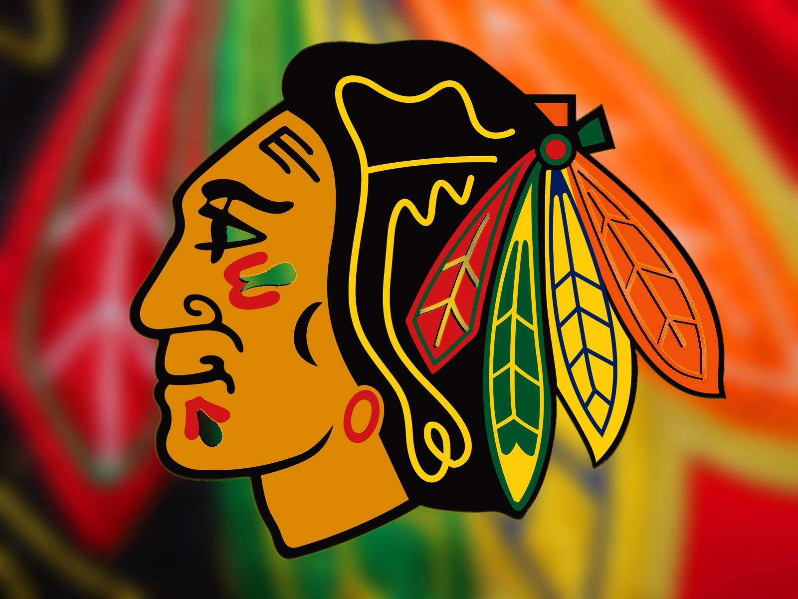 Blackhawks 桌布 壁紙 — 充滿活力的芝加哥黑鷹隊標誌，帶有粗獷的羽毛和部落面孔設計，背景為色彩繽紛的模糊效果。