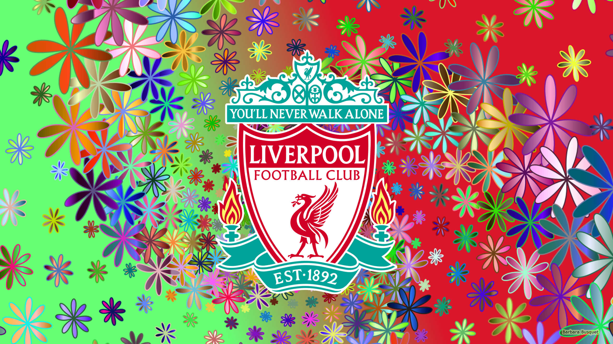 Liverpool Fc Desktop 桌布 壁紙 — 充滿活力的花卉圖案圍繞著標誌性的利物浦足球俱樂部徽章，上有紅色的利物鳥和「You'll Never Walk Alone」格言。