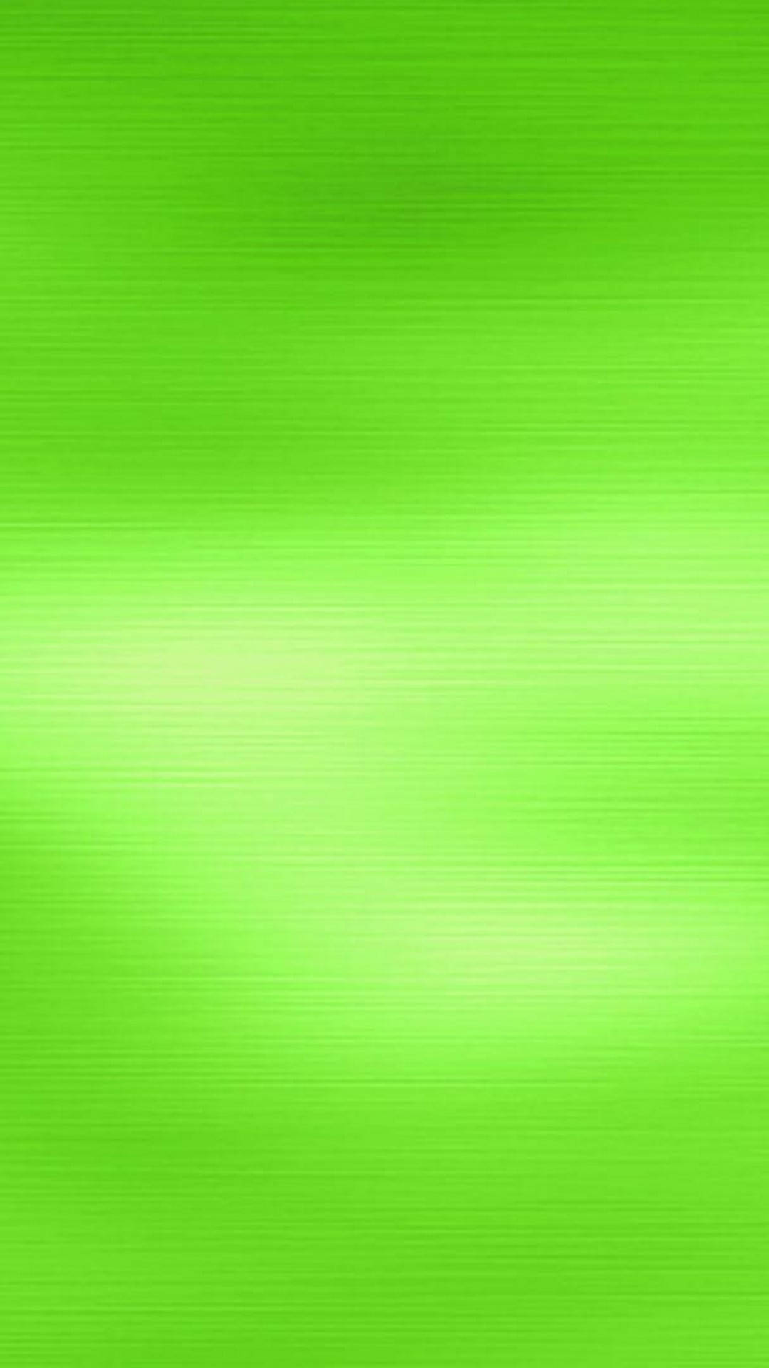 Plain Green 桌布 壁紙 — 充滿活力的萊姆綠色漸變，帶有微妙的水平刷紋理和柔和的光暈效果。
