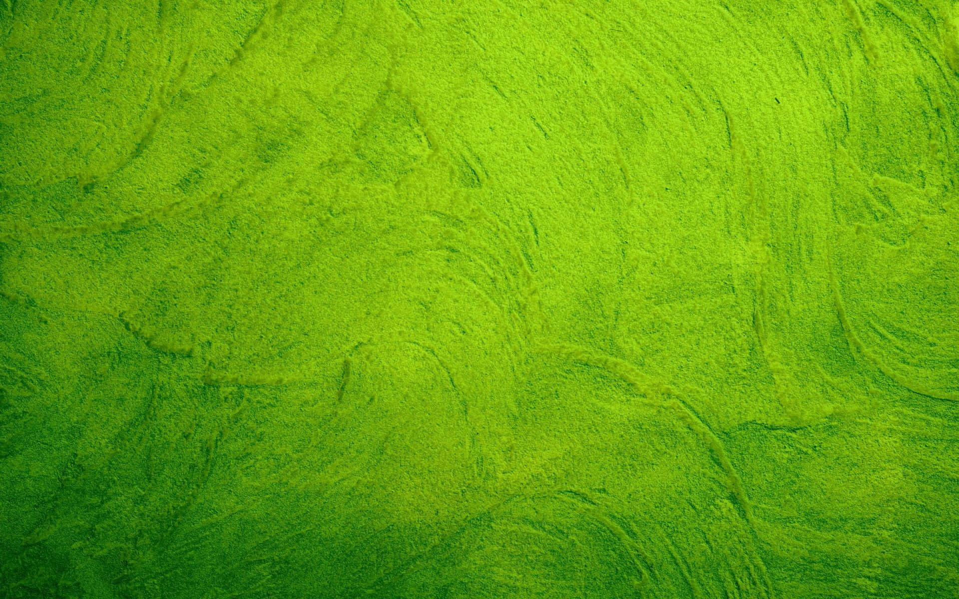 Green Texture 桌布 壁紙 — 充滿活力的萊姆綠色紋理表面，帶有旋轉的筆觸圖案和微妙的漸變照明。