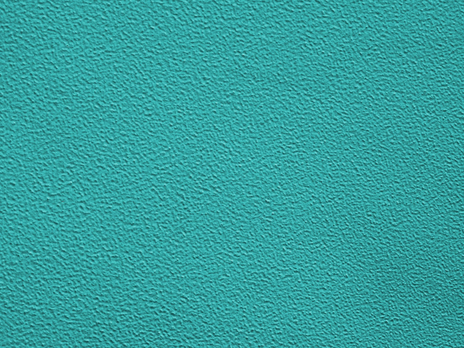Turquoise Blue 桌布 壁紙 — 充滿活力的藍綠色紋理表面特寫，整個畫面呈現均勻的鵝卵石圖案。
