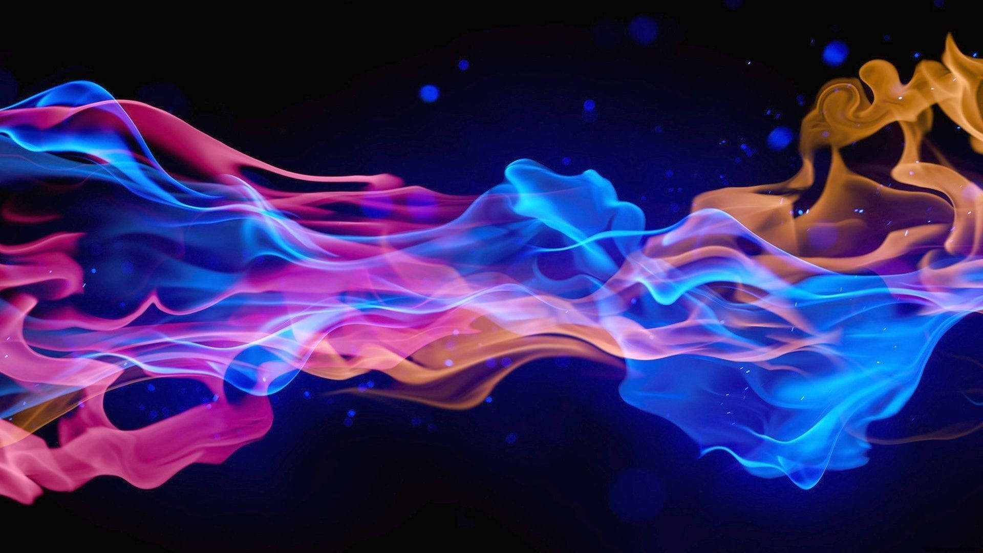 Flame 桌布 壁紙 — 充滿活力的藍色、粉紅色和橙色火焰在黑暗的宇宙背景下動態流動，並帶有發光粒子。