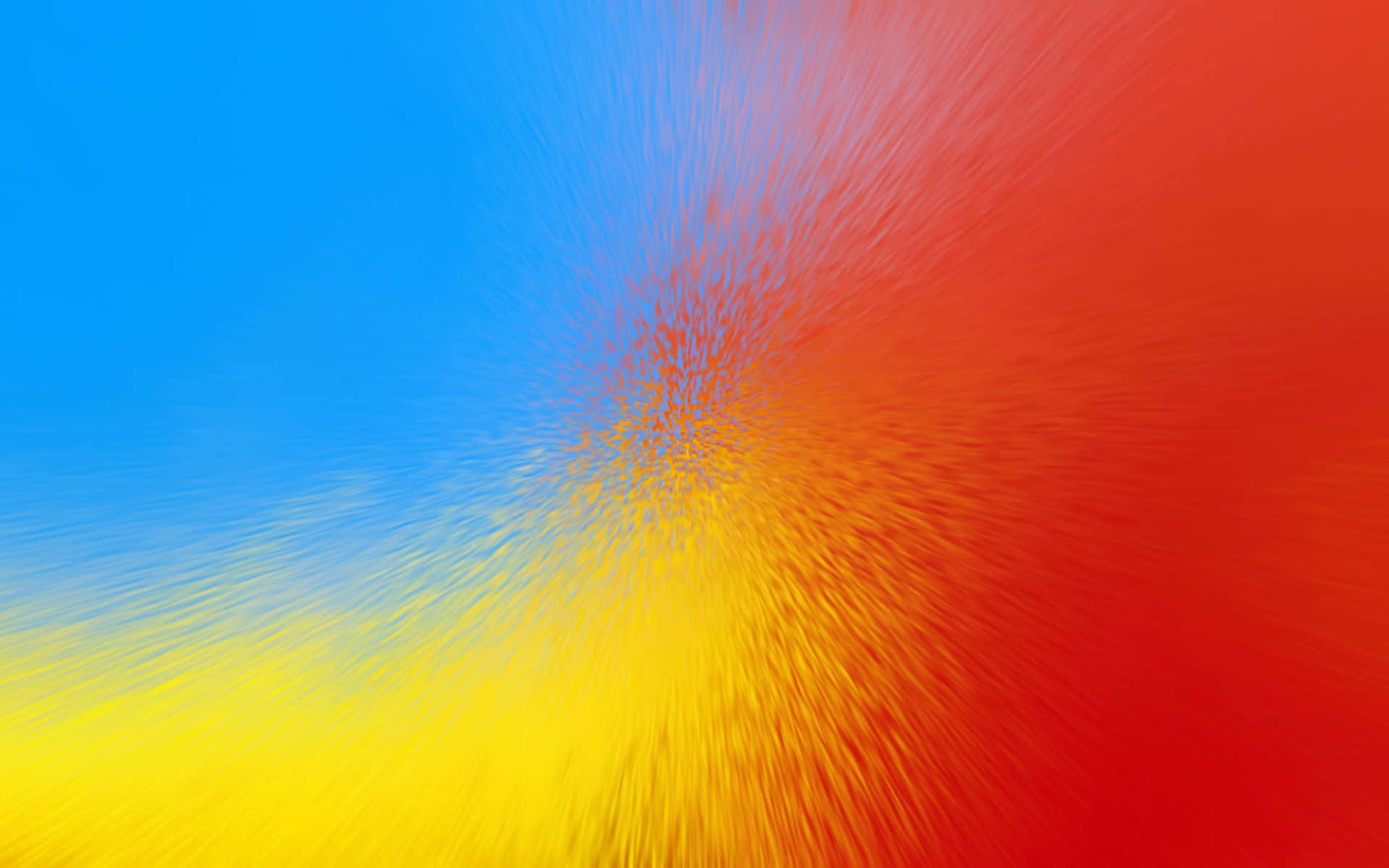 Gradient 桌布 壁紙 — 充滿活力的藍色、黃色和紅色抽象爆發，從中心向外輻射，帶有動態條紋。