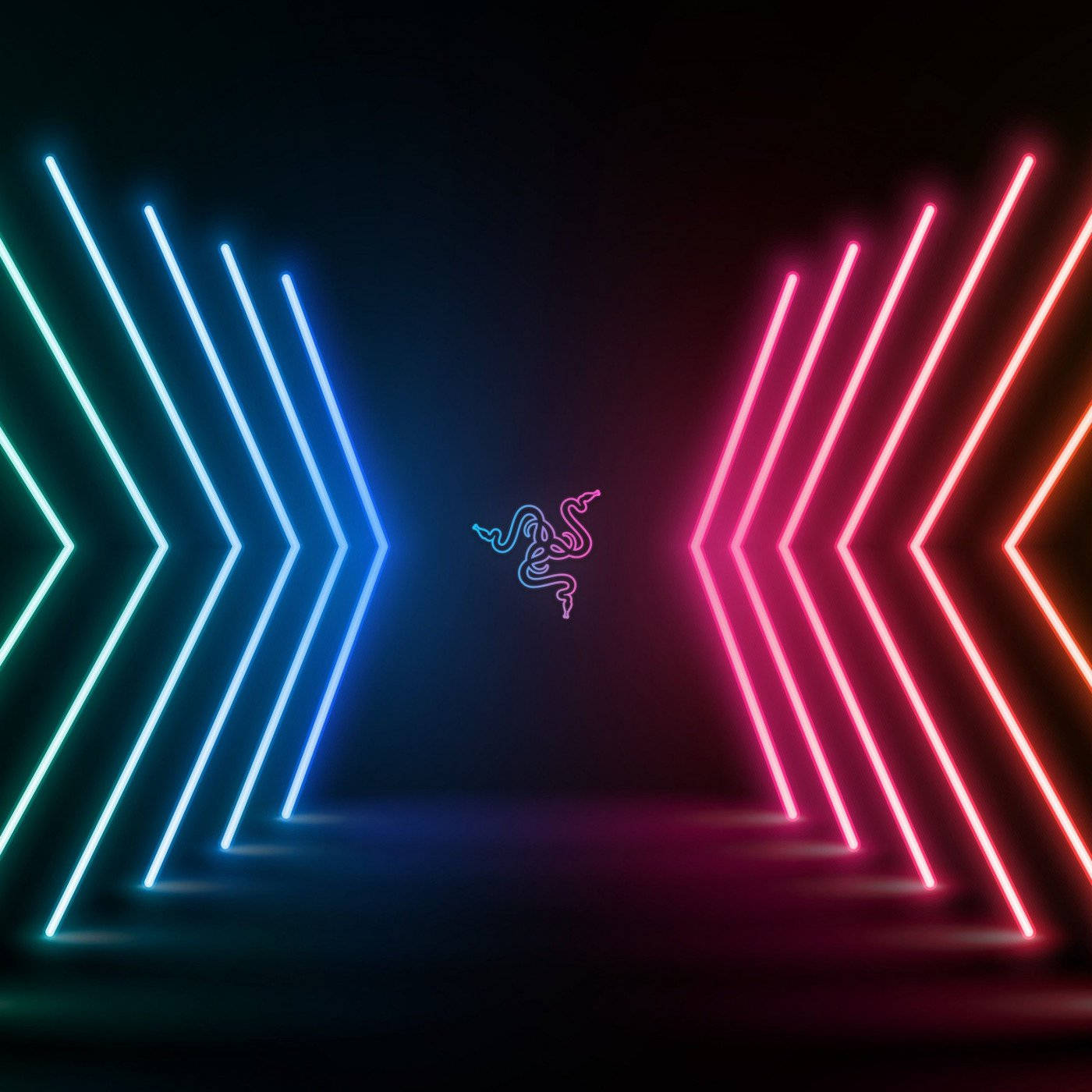 Neon Light 桌布 壁紙 — 充滿活力的藍色和粉紅色霓虹箭頭在黑暗的未來主義走廊中匯聚到發光的Razer標誌。