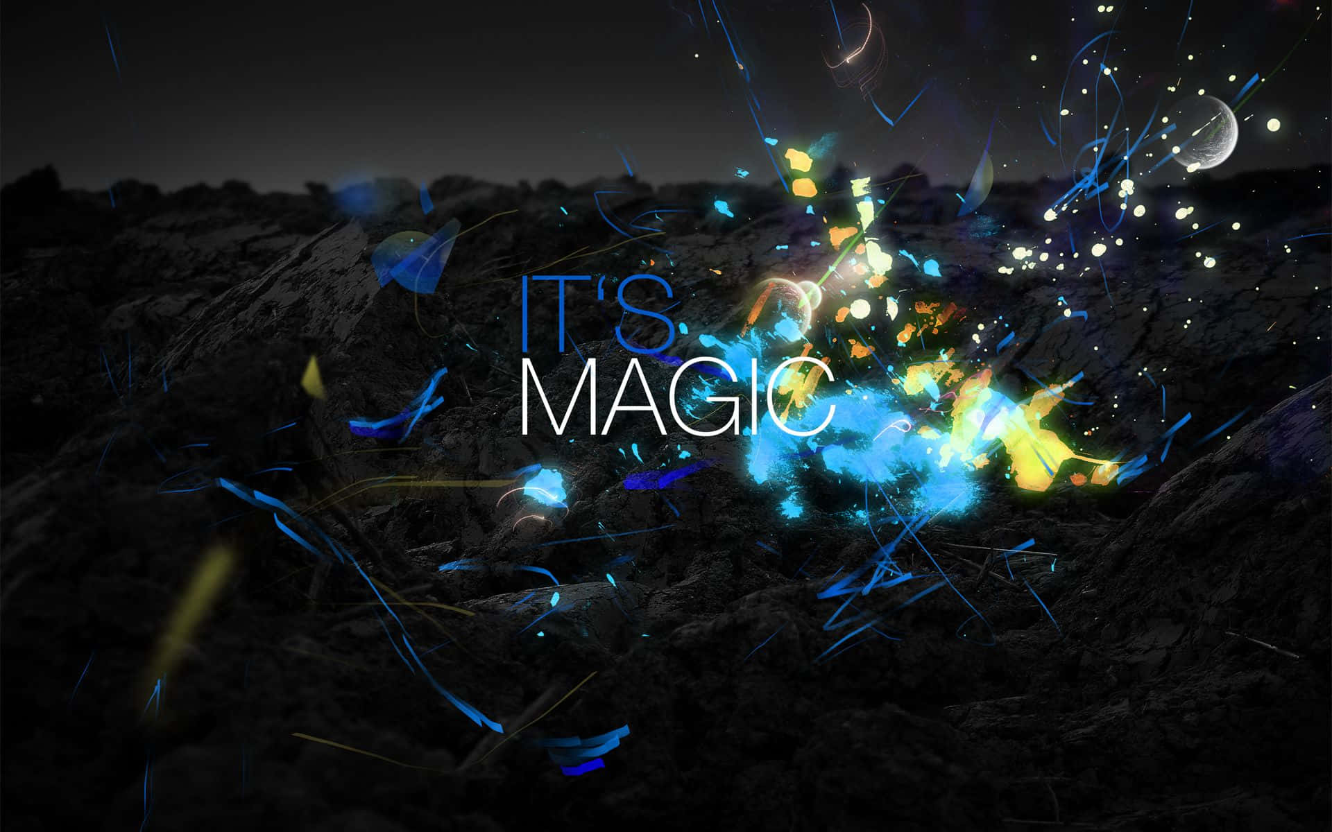 Dark Magic 桌布 壁紙 — 充滿活力的藍色和黃色魔法粒子在黑暗岩石表面上爆炸，中央有發光的「IT'S MAGIC」文字。