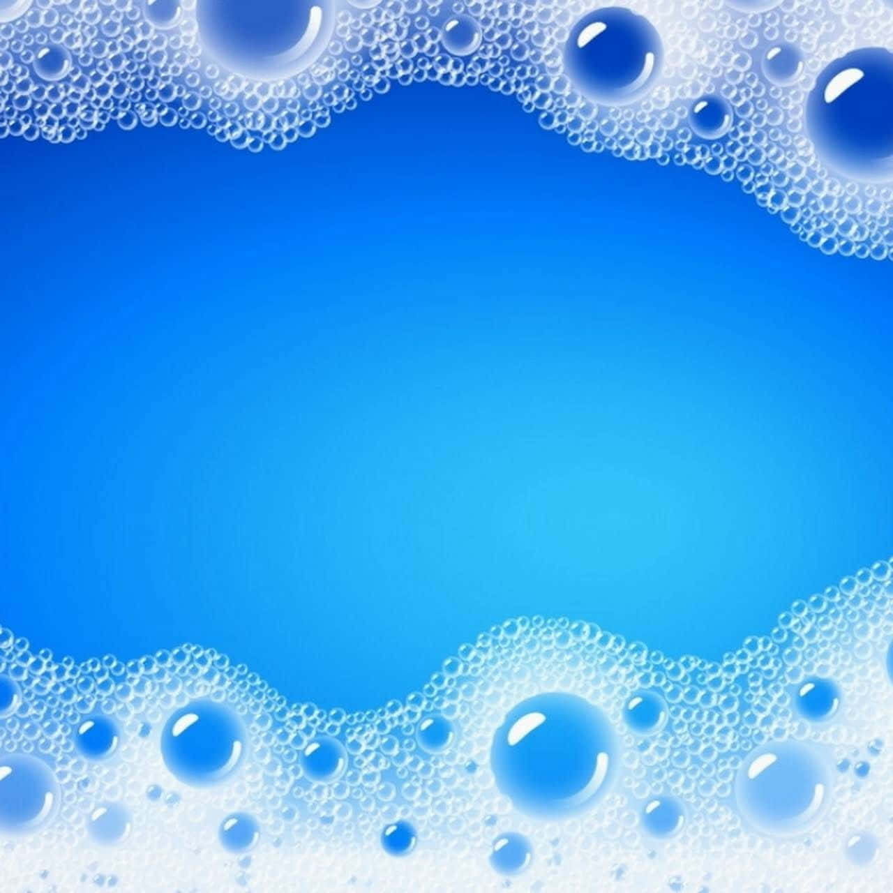 Bubbles 桌布 壁紙 — 充滿活力的藍色漸變背景，由精緻的白色肥皂泡和光澤高光點綴邊框。