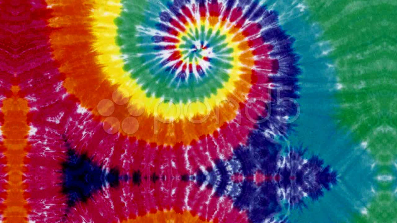 dye 桌布 壁紙 — 充滿活力的迷幻紮染圖案從色彩繽紛的螺旋中心散發出來，帶有鮮豔的彩虹色調。