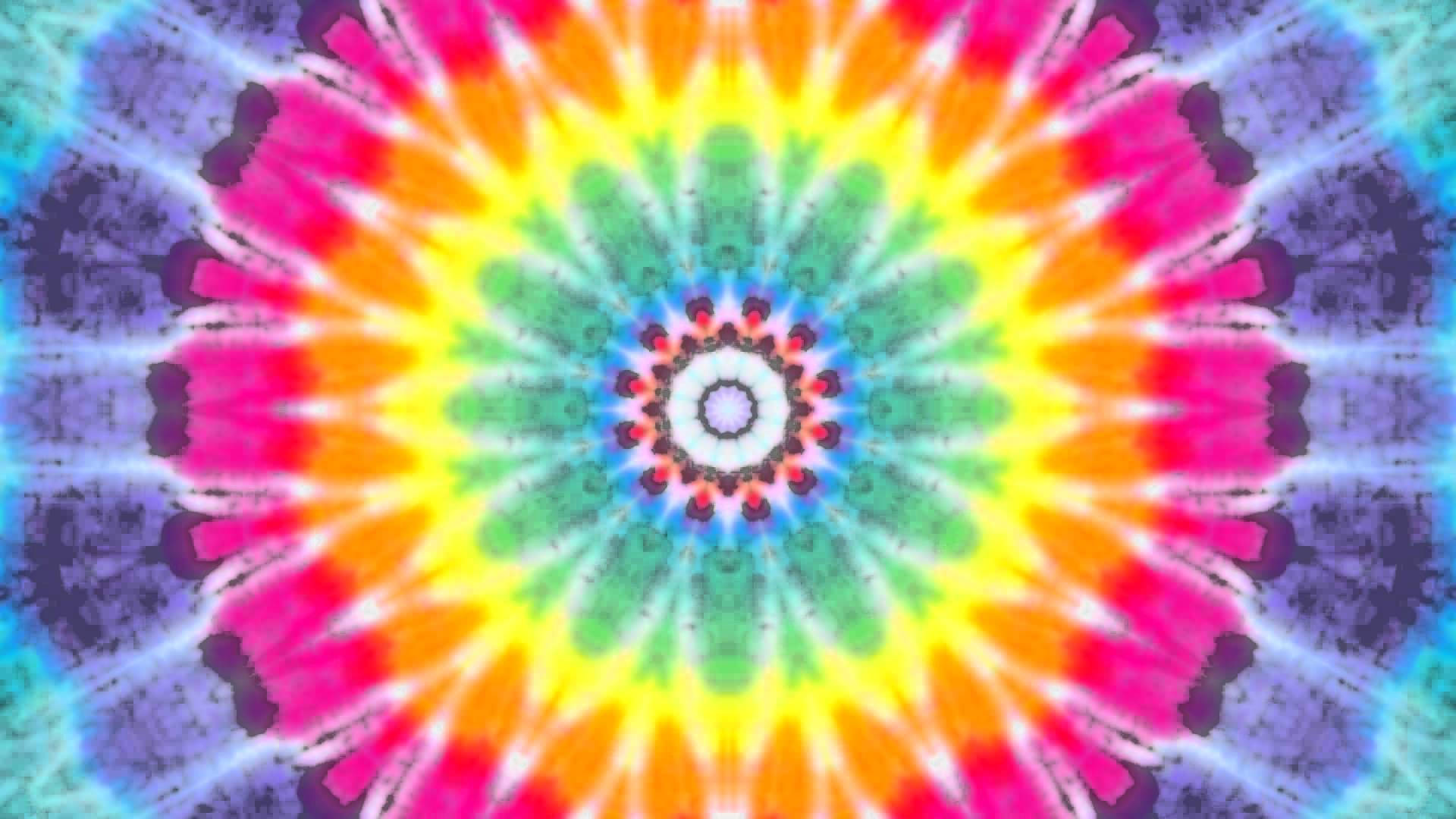 dye 桌布 壁紙 — 充滿活力的迷幻紮染曼陀羅從中央白色核心散發出對稱的彩虹色調。