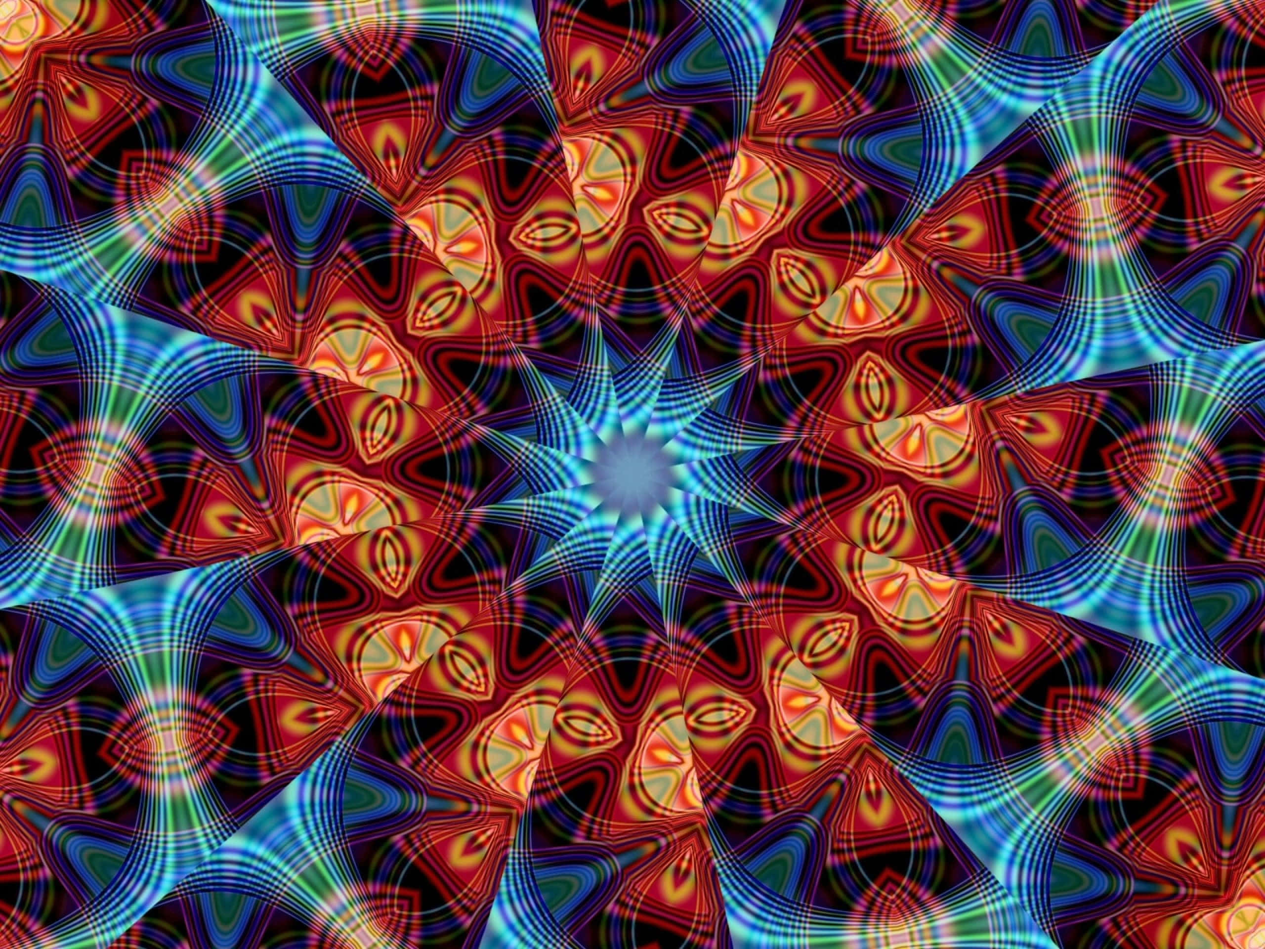 Psychedelic Fractals 桌布 壁紙 — 充滿活力的迷幻萬花筒，帶有旋轉的紅色、藍色和藍綠色圖案，從中央的星爆向黑色背景輻射。