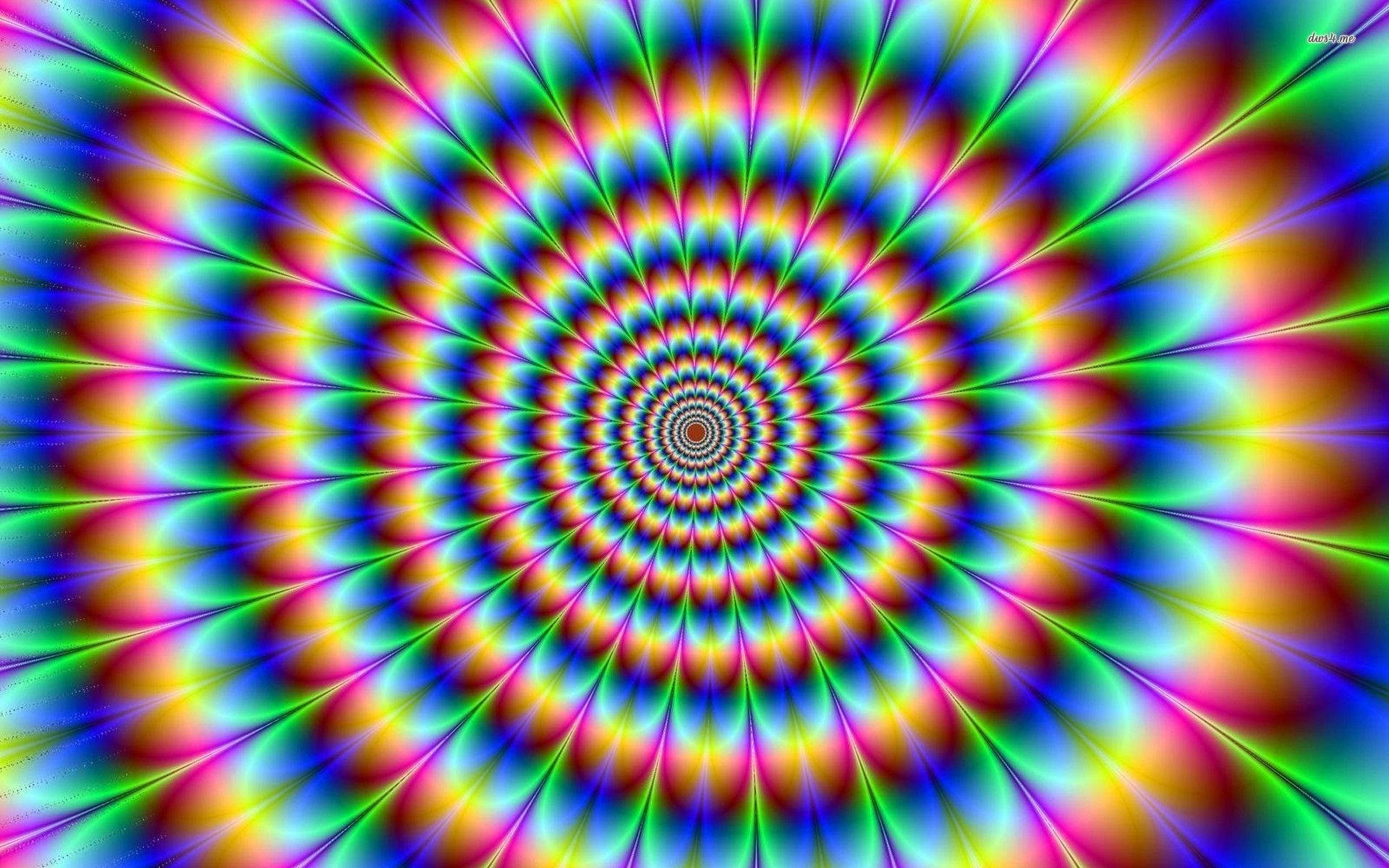 酷 桌布 壁紙 — 充滿活力的迷幻螺旋向外輻射，彩虹色調營造出迷人的視錯覺。
