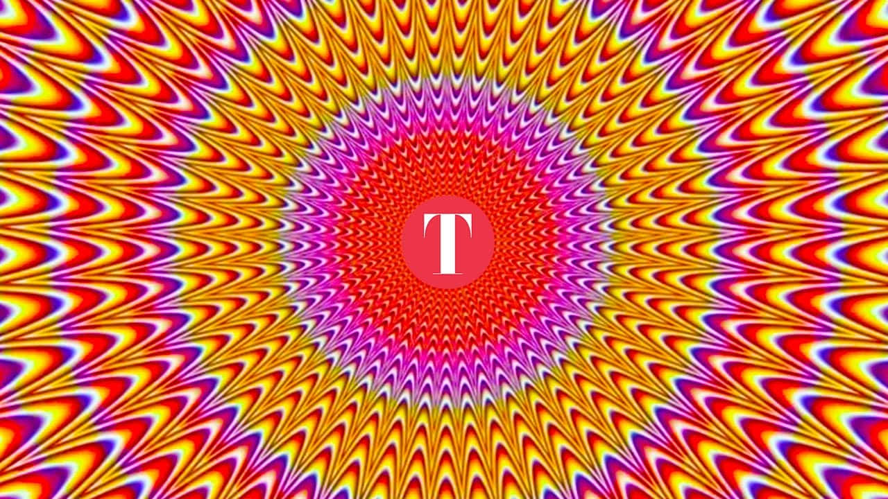 彩色動圖 桌布 壁紙 — 充滿活力的迷幻螺旋從中央的紅色圓圈和白色「T」標誌向外輻射。