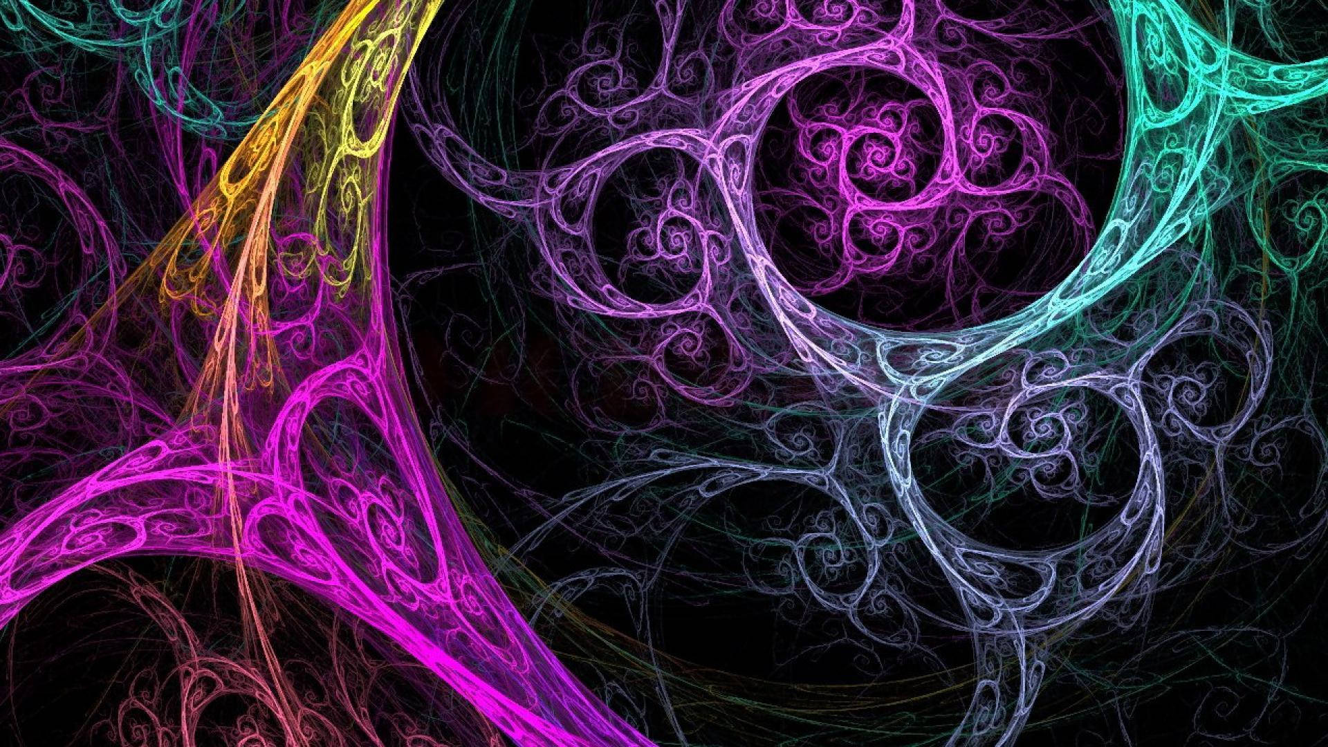 Cool HD 桌布 壁紙 — 充滿活力的霓虹分形圖案在黑色背景上以發光的色調旋轉，創造出超凡脫俗的數位藝術品。