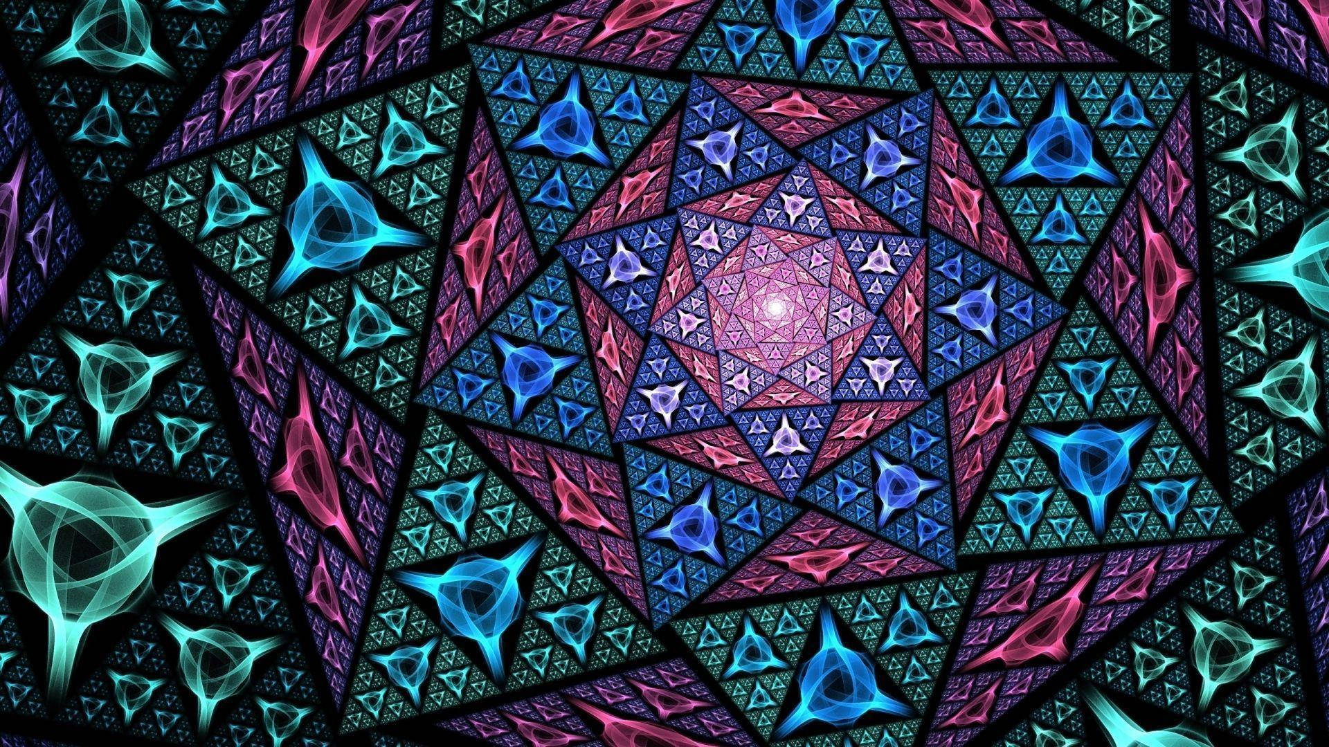 藝術 桌布 壁紙 — 充滿活力的霓虹分形圖案從發光的中心輻射出來，帶有電光藍和洋紅色的重複三角形圖案，背景為黑色。