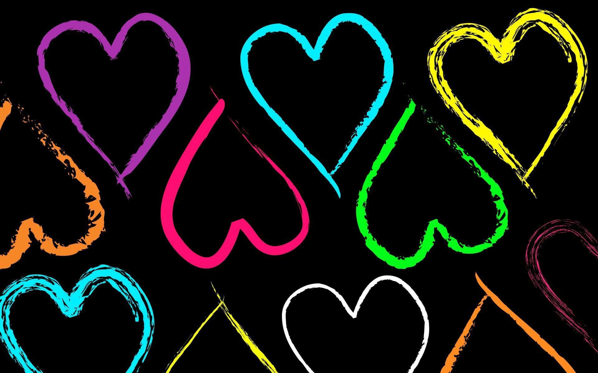 Neon Heart 桌布 壁紙 — 充滿活力的霓虹心形以粉筆般的筆觸繪製，漂浮在純黑背景上。