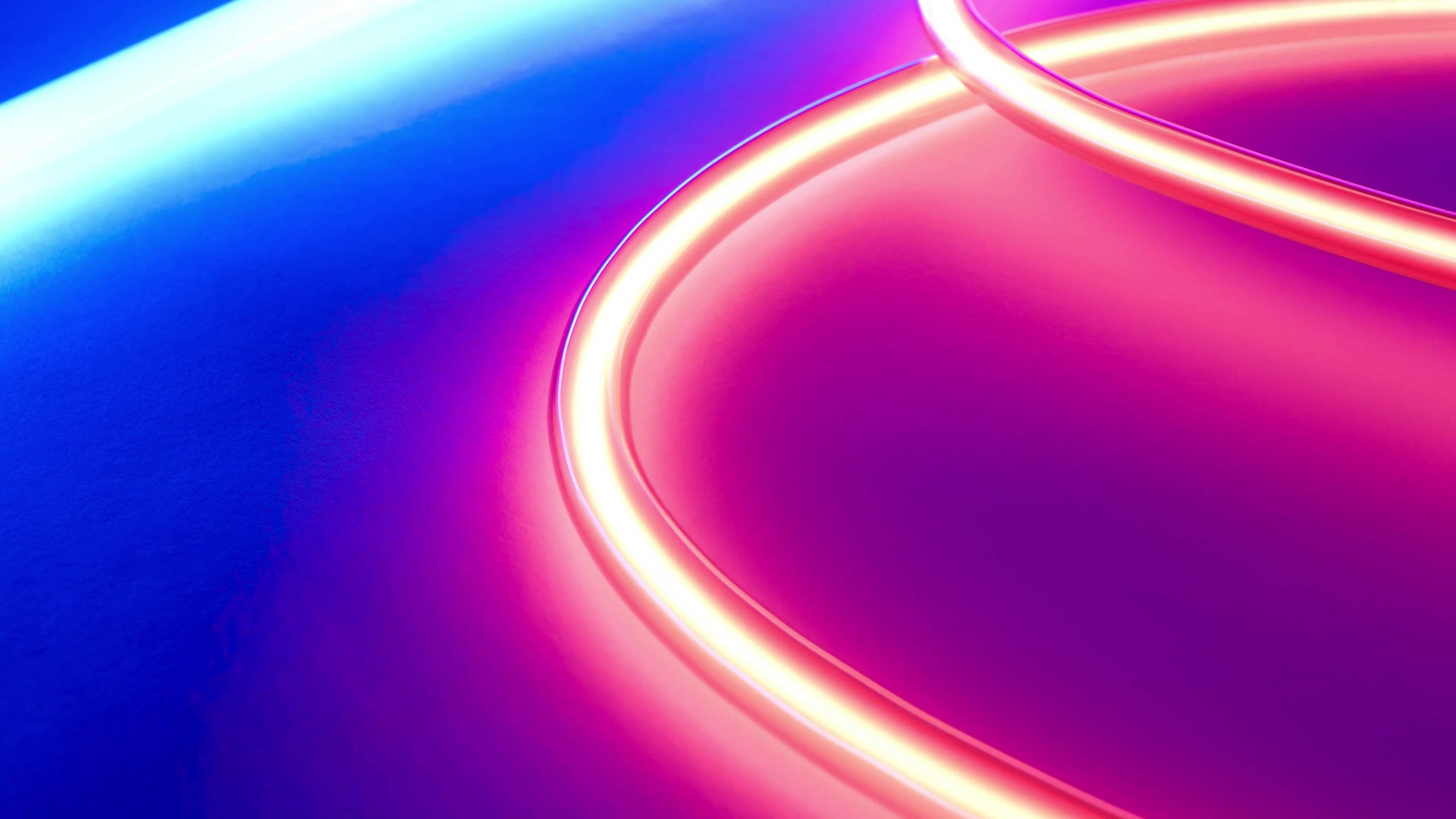 Neon Light 桌布 壁紙 — 充滿活力的霓虹曲線在平滑漸變背景上閃耀著電光藍和洋紅色。
