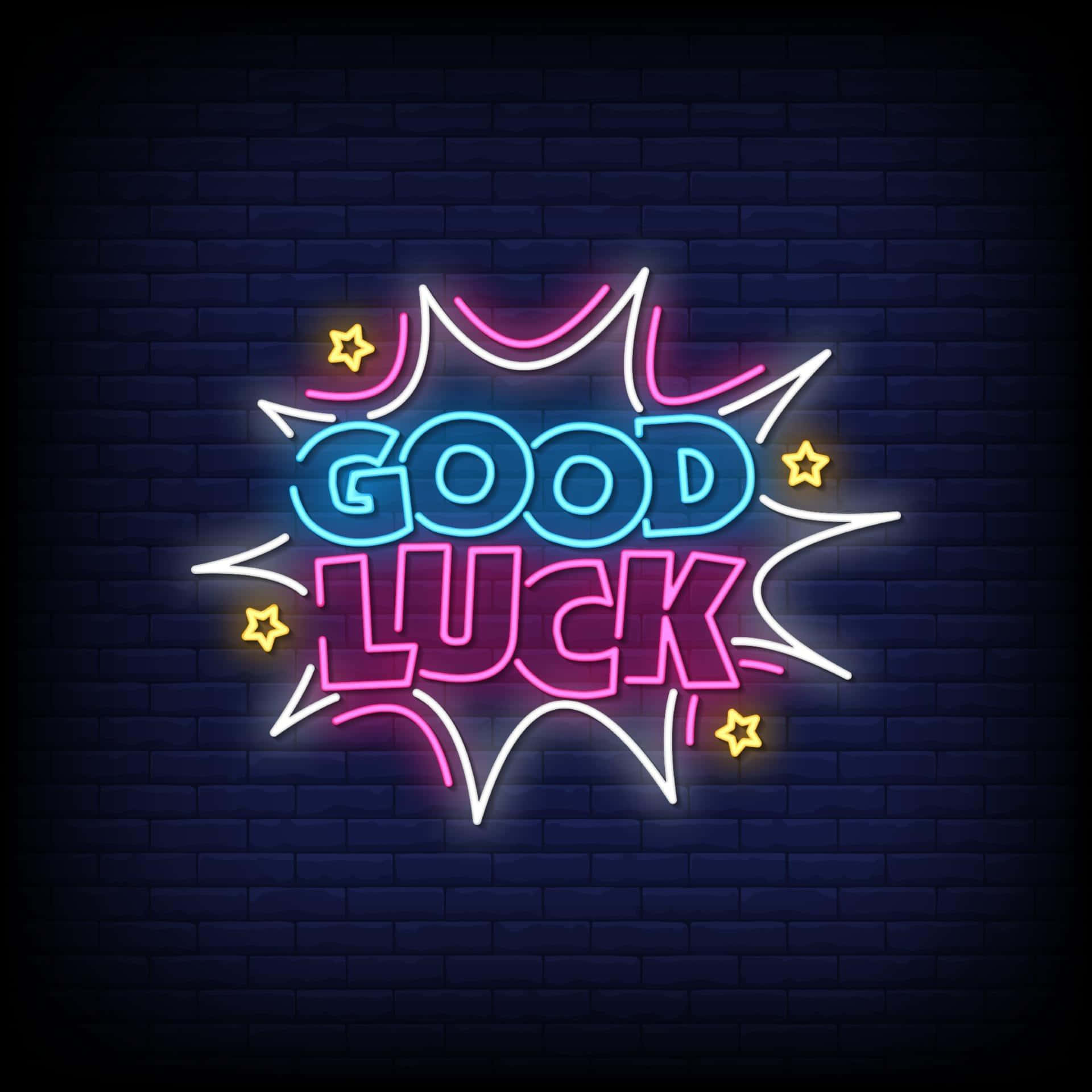 Good Luck 桌布 壁紙 — 充滿活力的霓虹燈「好運」標誌，粉紅色、藍色和黃色星星在深色磚牆上綻放。