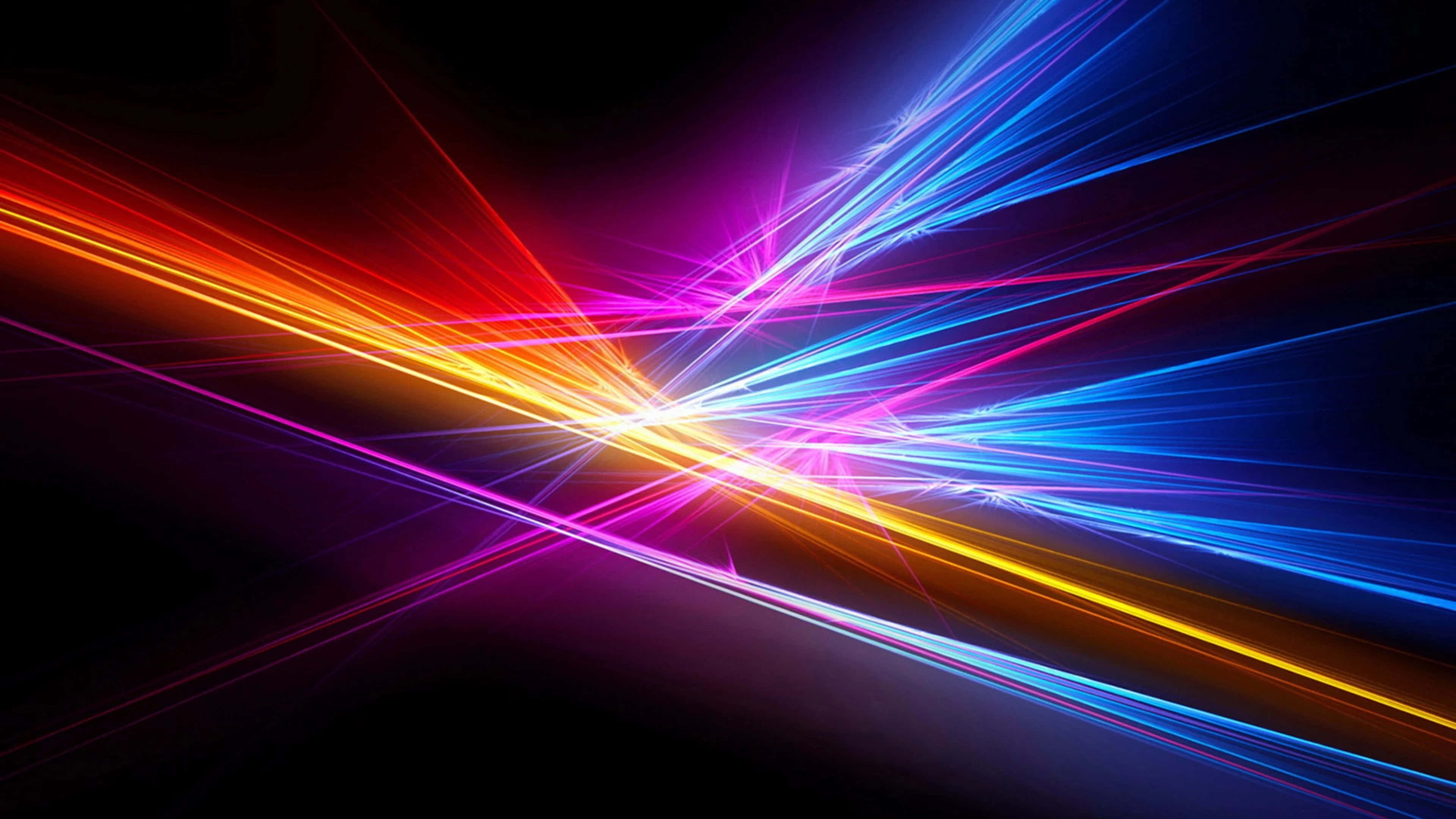 Light 桌布 壁紙 — 充滿活力的霓虹燈光條紋在黑色虛空中爆炸，形成動態的抽象爆發。